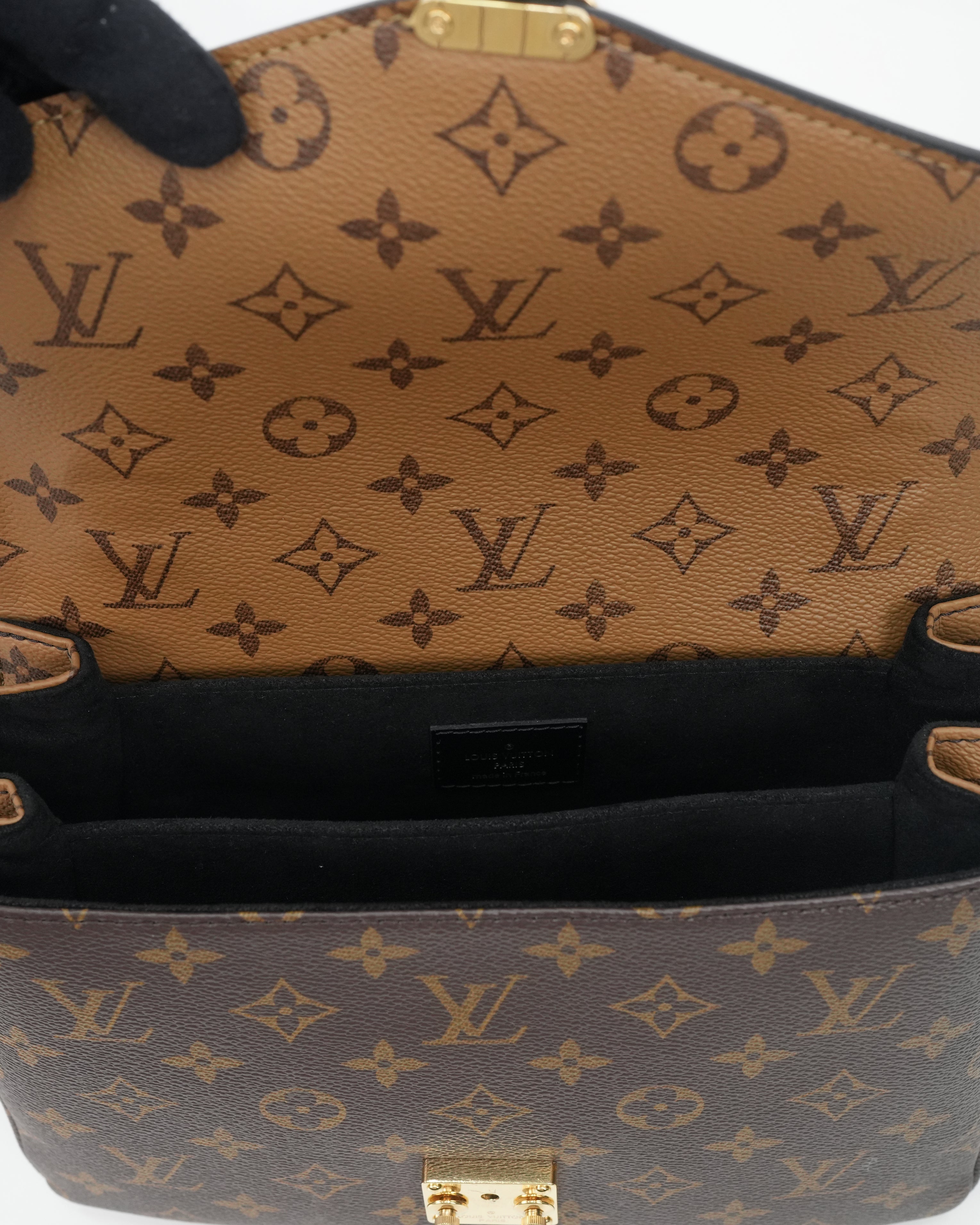 MONOGRAM REVERSE POCHETTE METIS MM