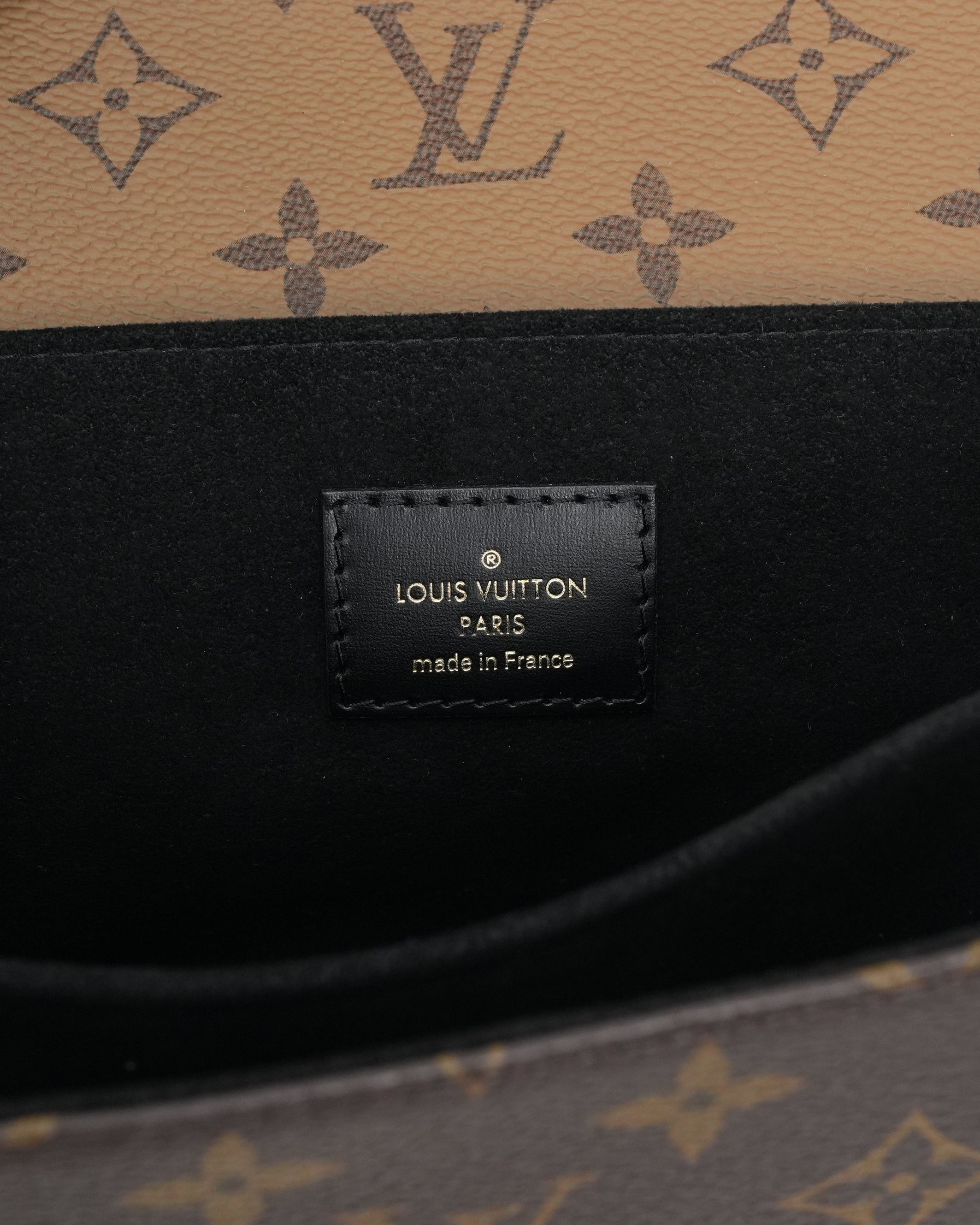 MONOGRAM REVERSE POCHETTE METIS MM