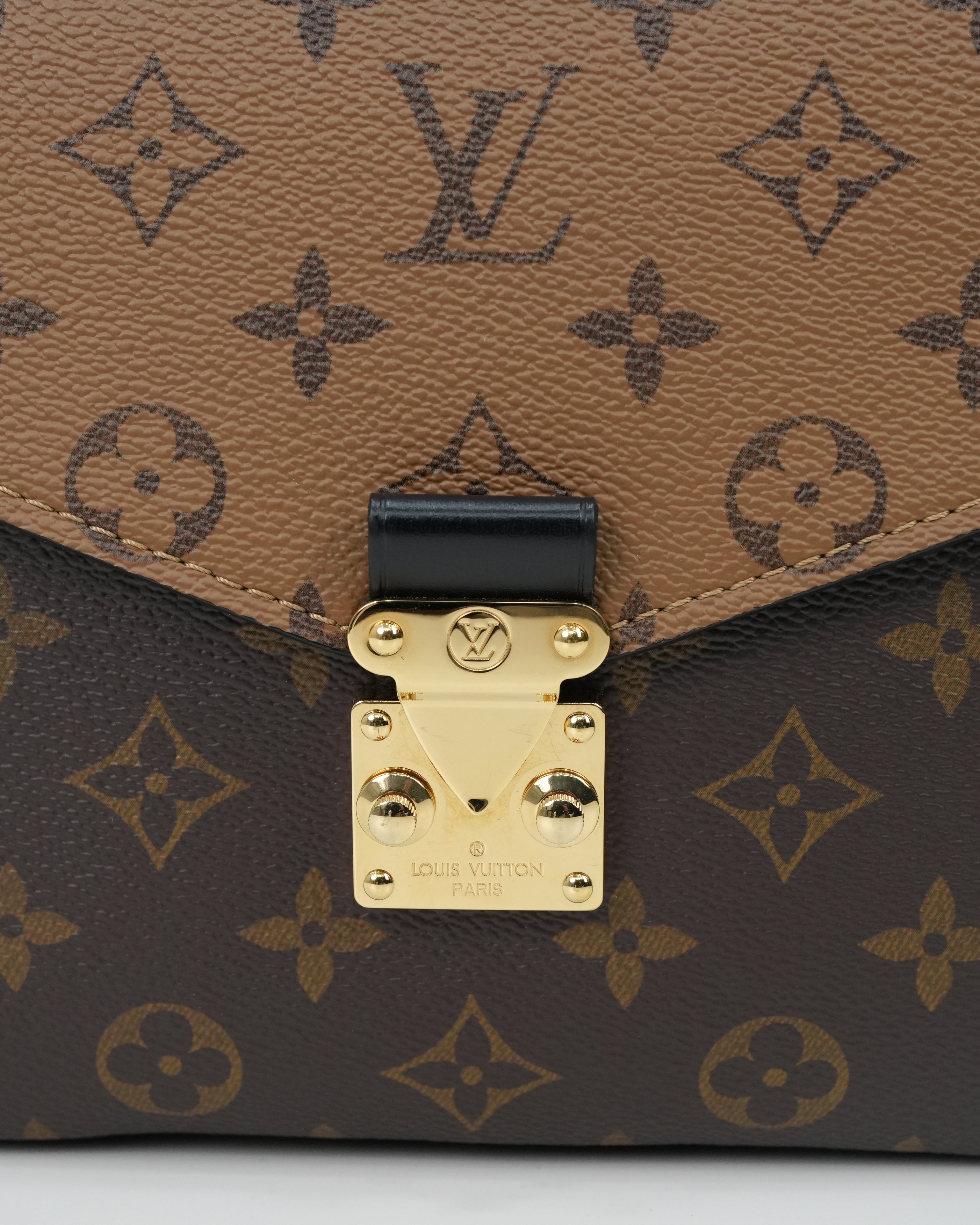 MONOGRAM REVERSE POCHETTE METIS MM