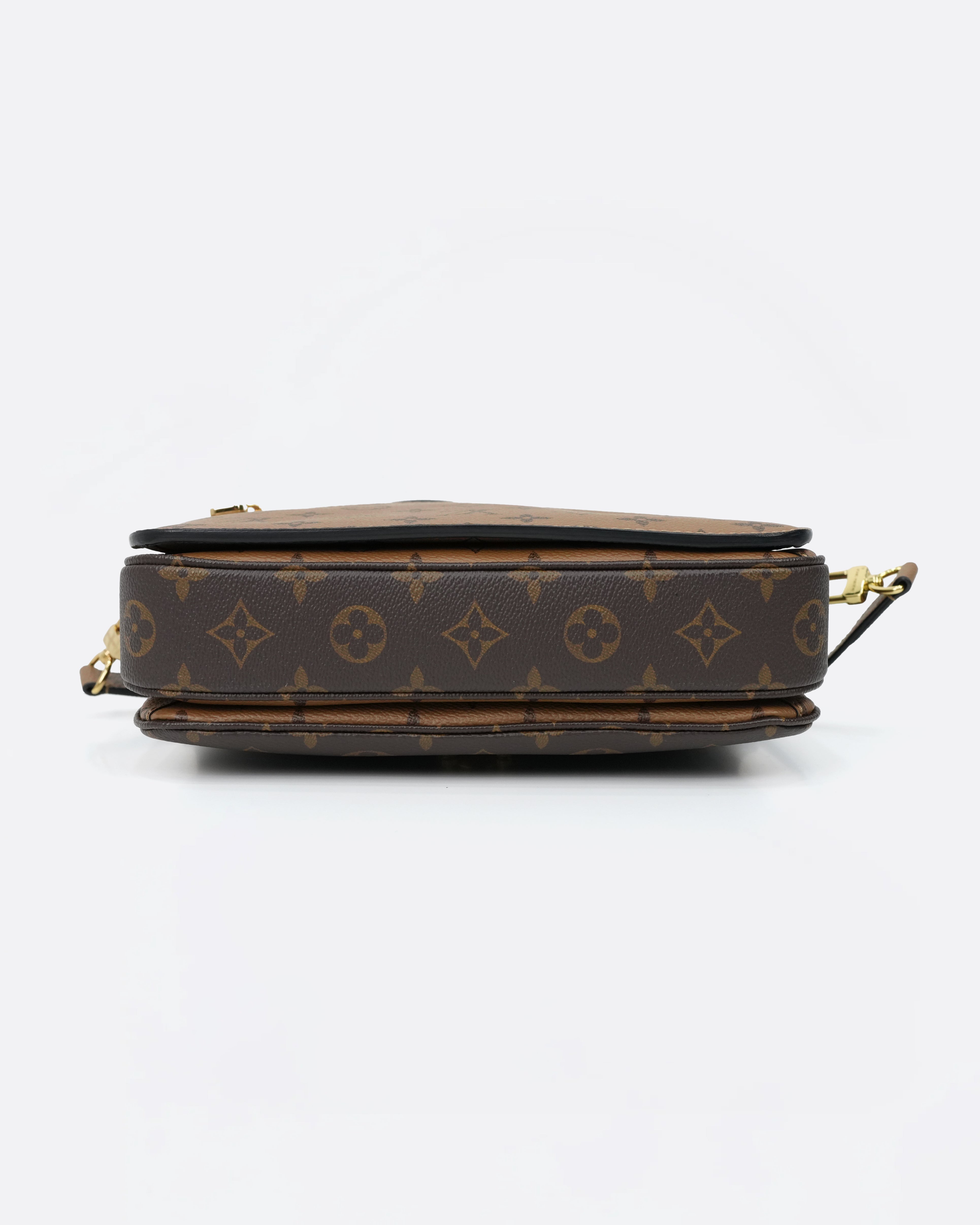 MONOGRAM REVERSE POCHETTE METIS MM