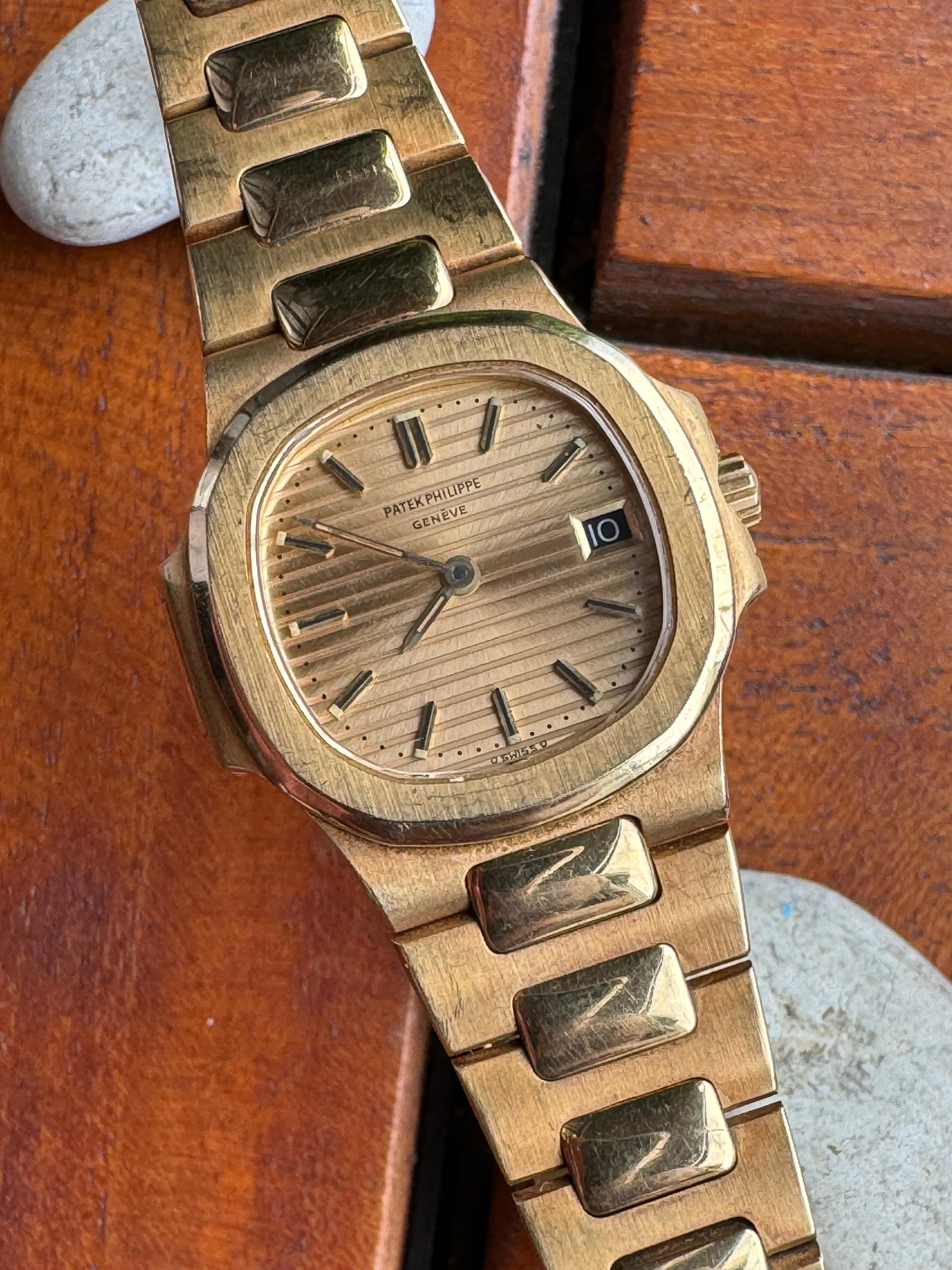 NAUTILUS LADIES 4700/1J YELLOWGOLD CHAMPAGNE DIAL QUARTZ (WATCH ONLY)