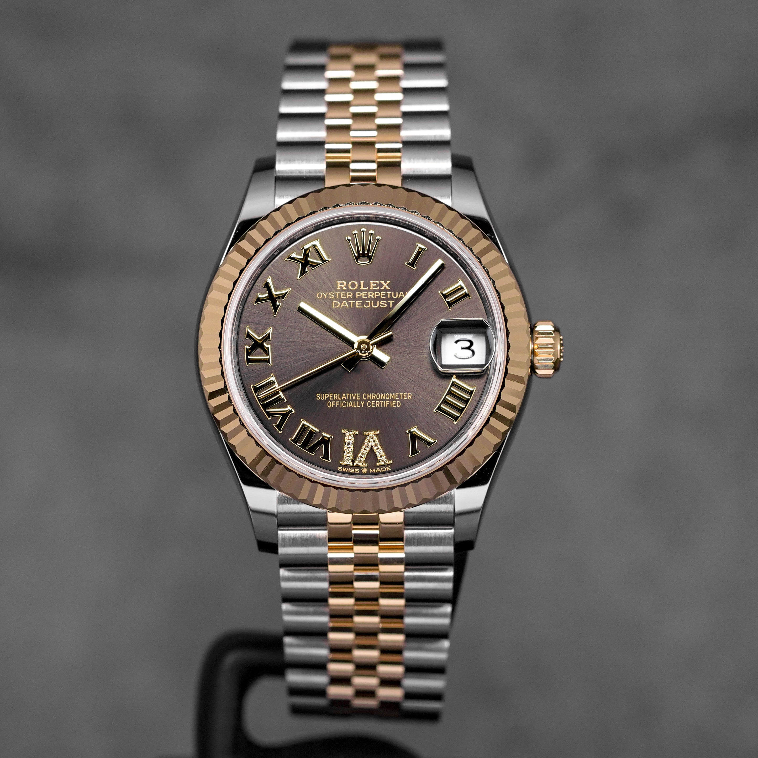 DATEJUST 31MM TWOTONE YELLOWGOLD DARK GREY ROMAN DIAL DIAMOND ON VI (2025)