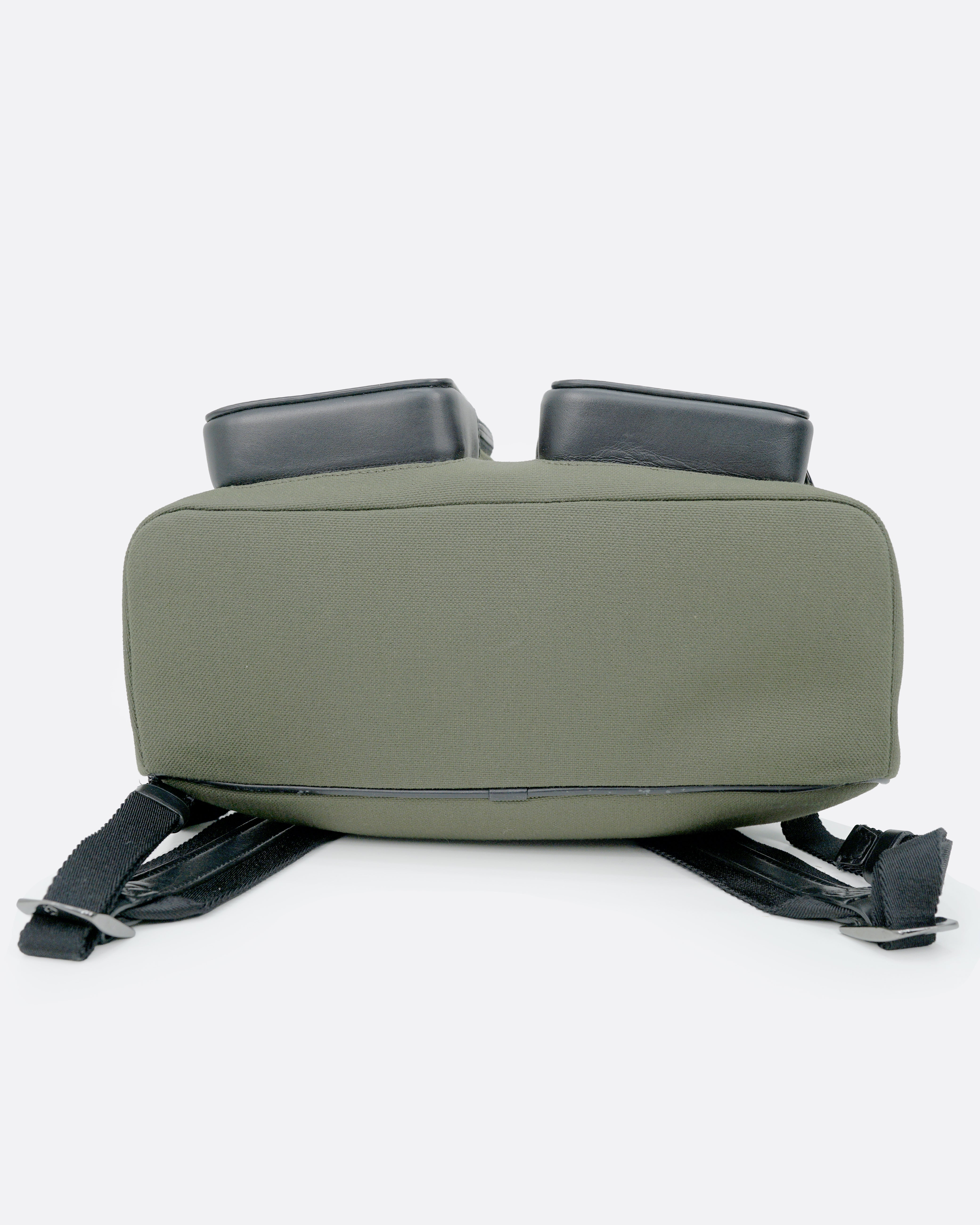 NEVER STILL BACKPACK OLIVE GREEN LEATHER-TRIMMED CANVAS