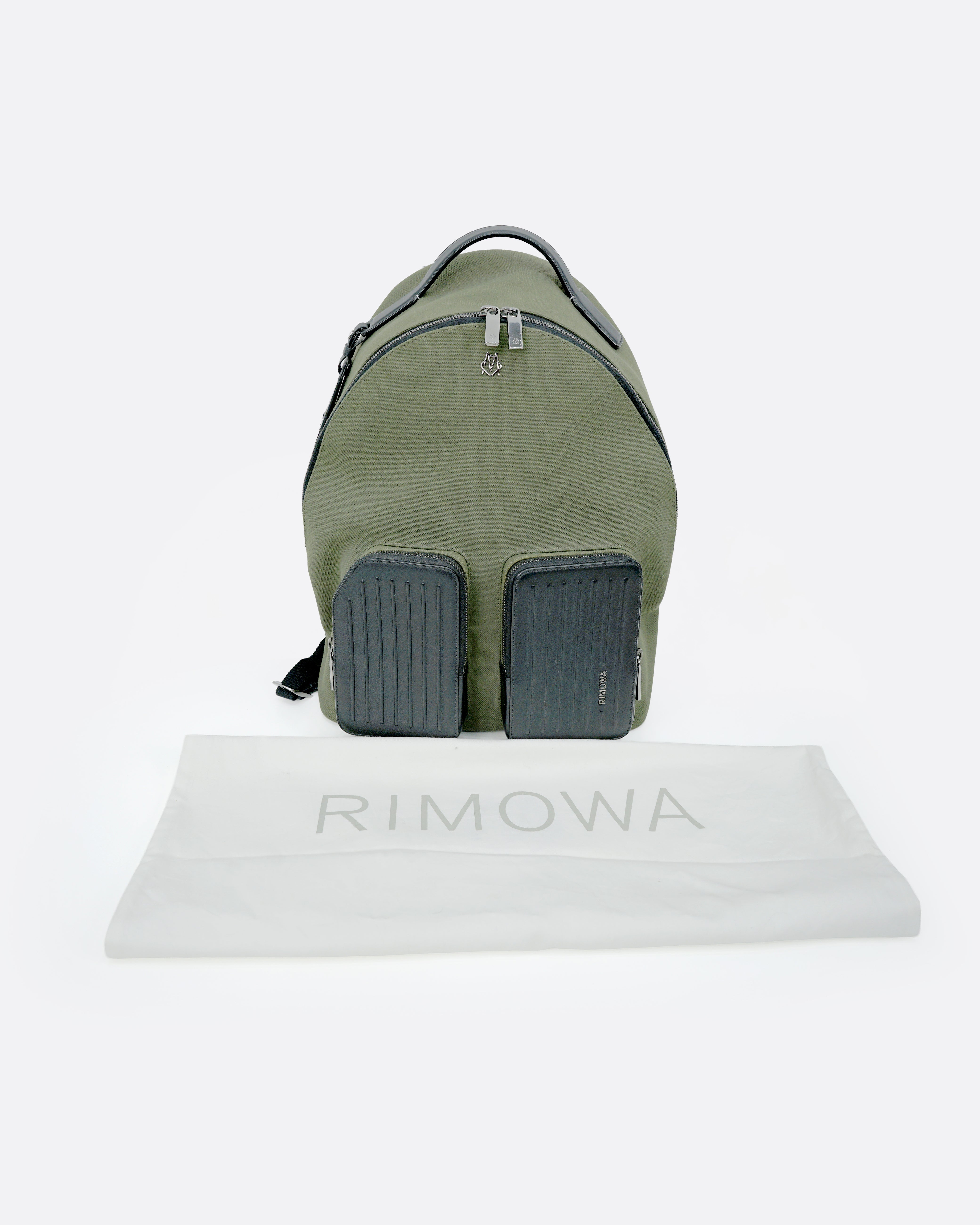 NEVER STILL BACKPACK OLIVE GREEN LEATHER-TRIMMED CANVAS