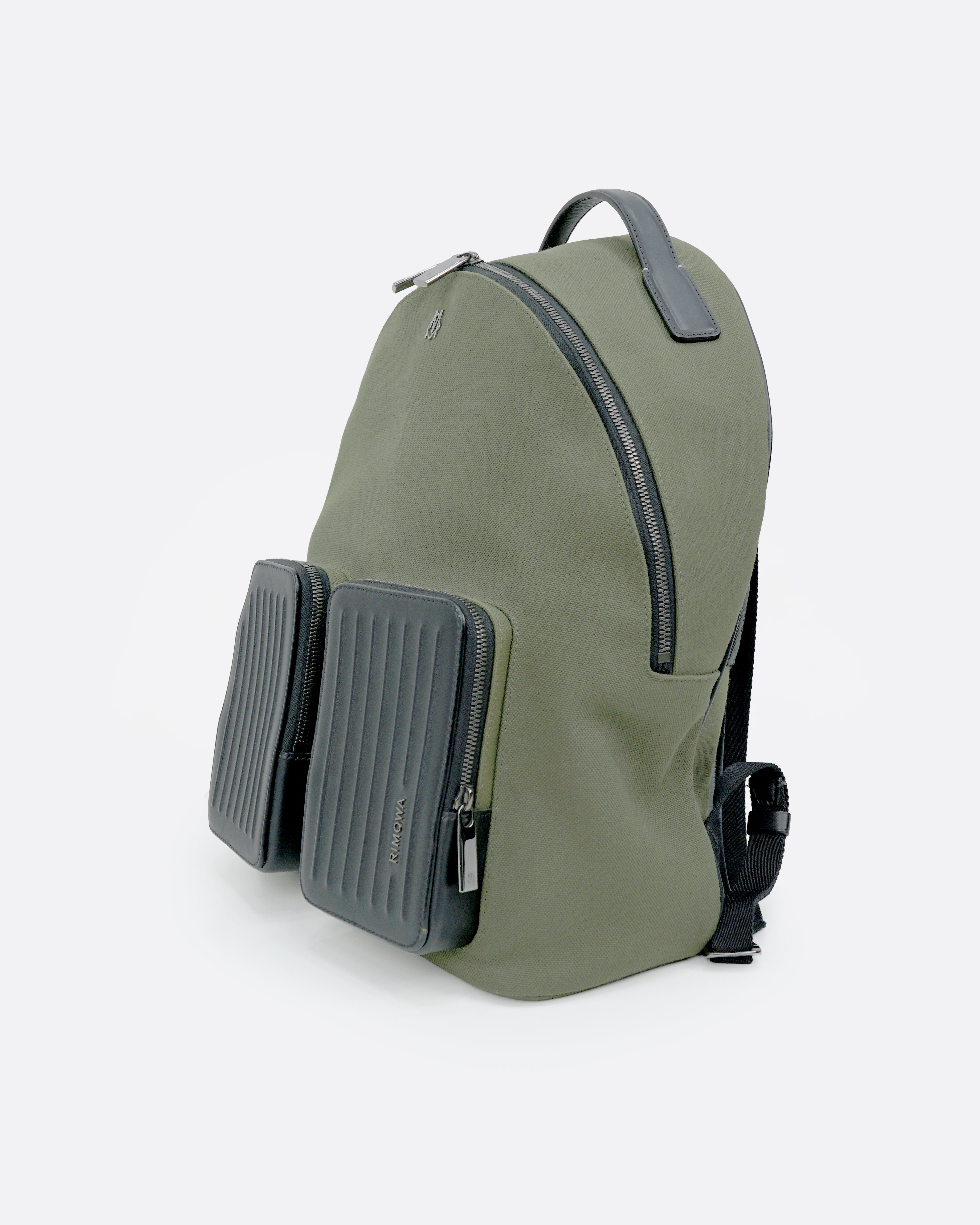 NEVER STILL BACKPACK OLIVE GREEN LEATHER-TRIMMED CANVAS