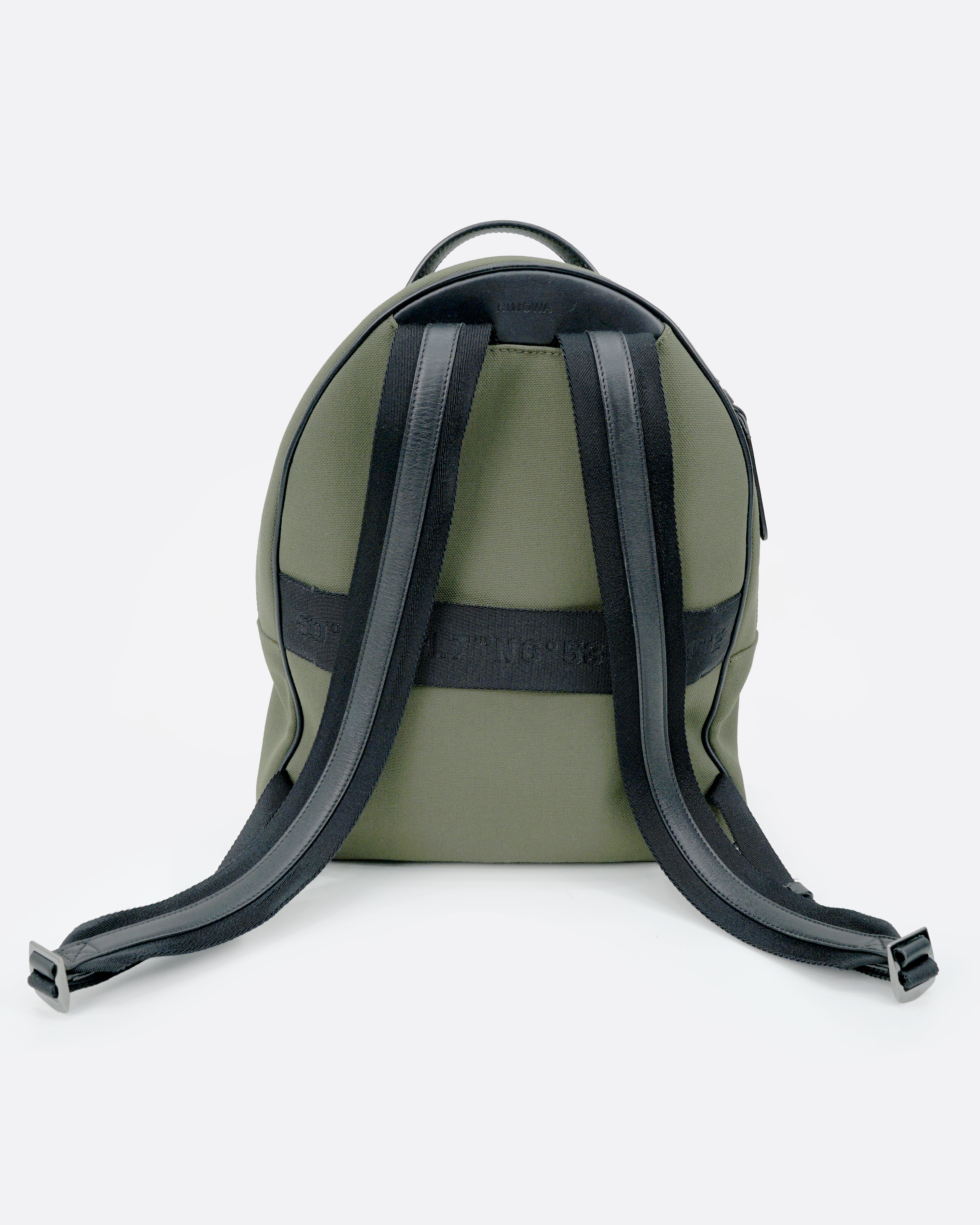 NEVER STILL BACKPACK OLIVE GREEN LEATHER-TRIMMED CANVAS