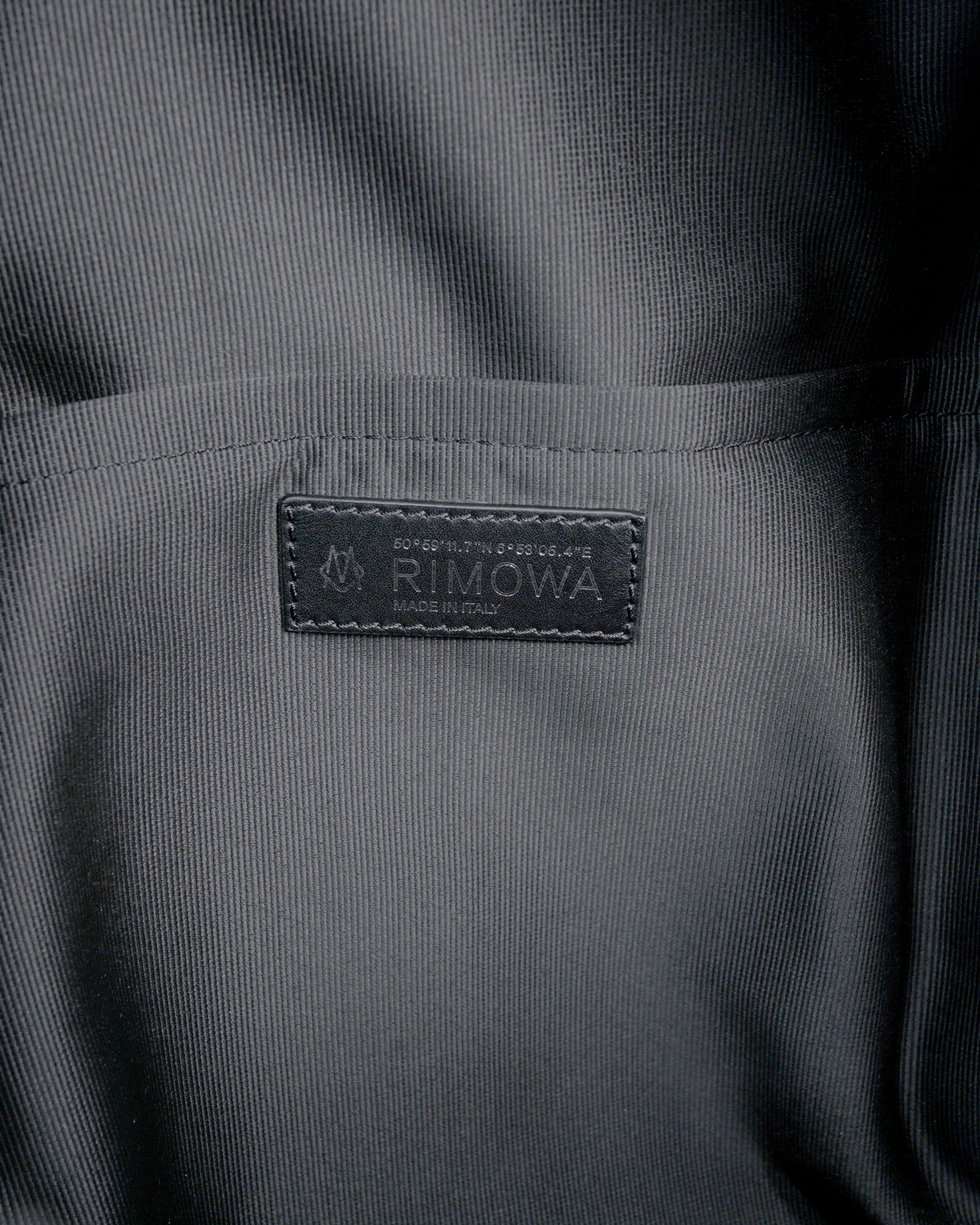 NEVER STILL BACKPACK OLIVE GREEN LEATHER-TRIMMED CANVAS