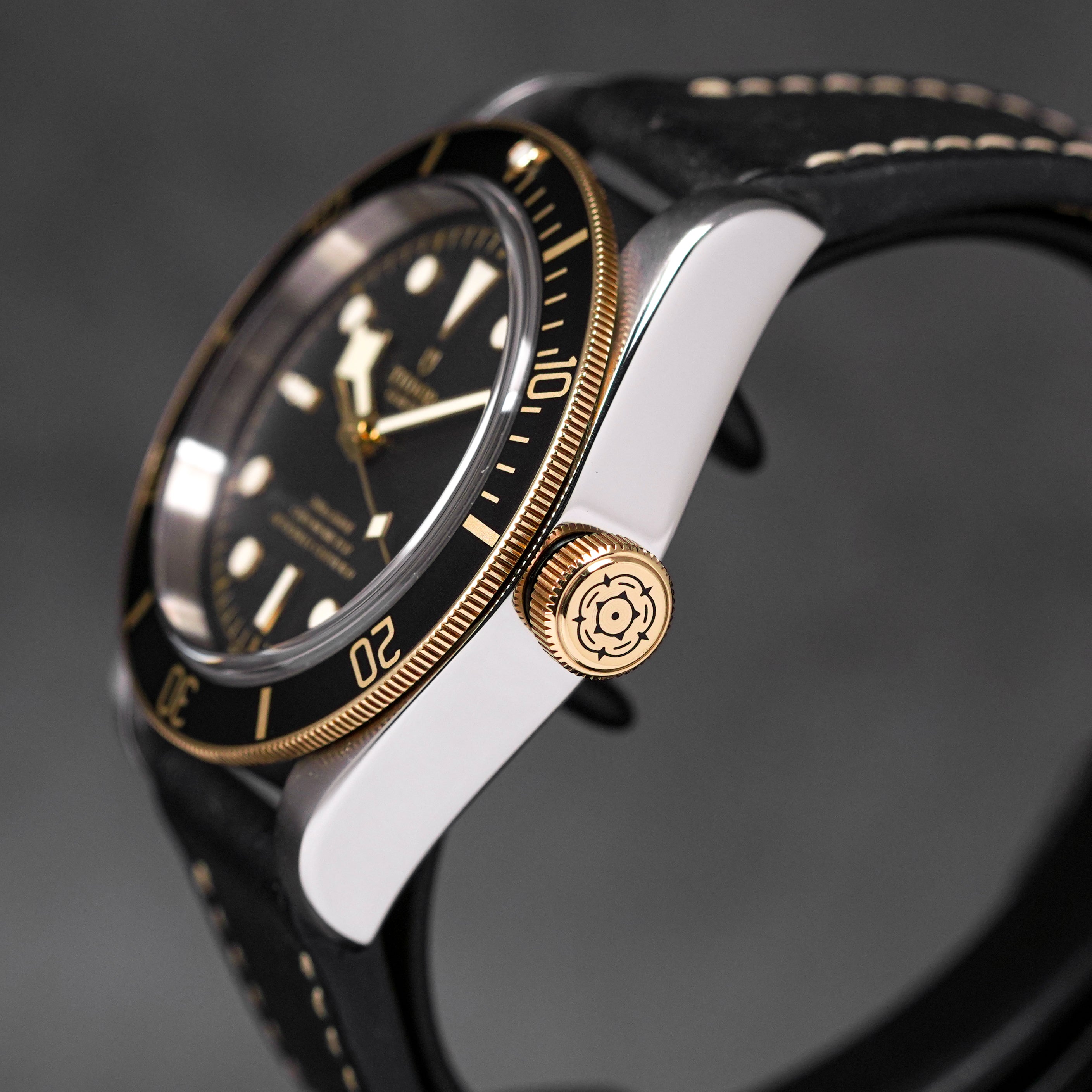 BLACK BAY TWOTONE YELLOWGOLD BLACK DIAL LEATHER STRAP (2017)