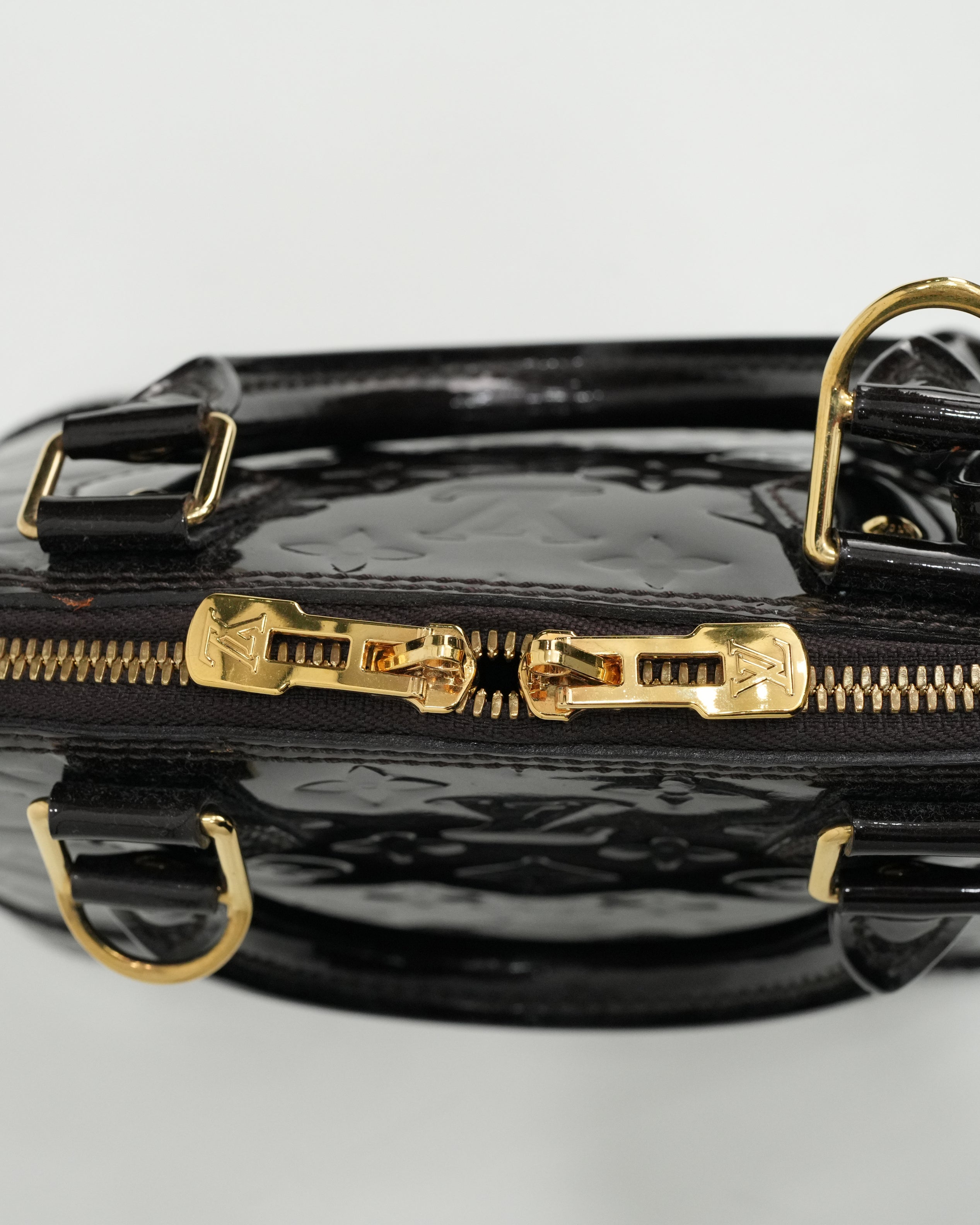 MONOGRAM VERNIS ALMA BB AMARANTE