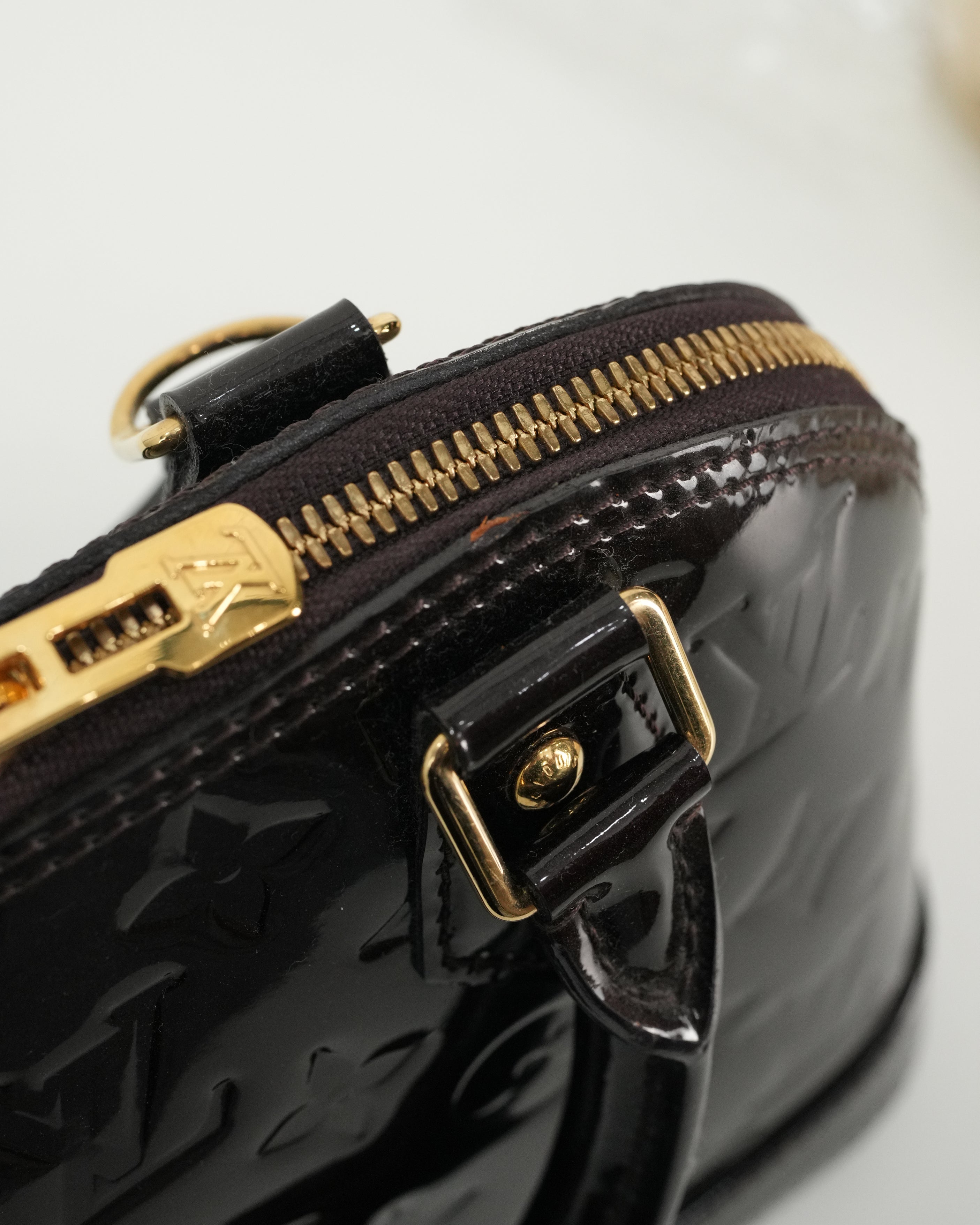 MONOGRAM VERNIS ALMA BB AMARANTE