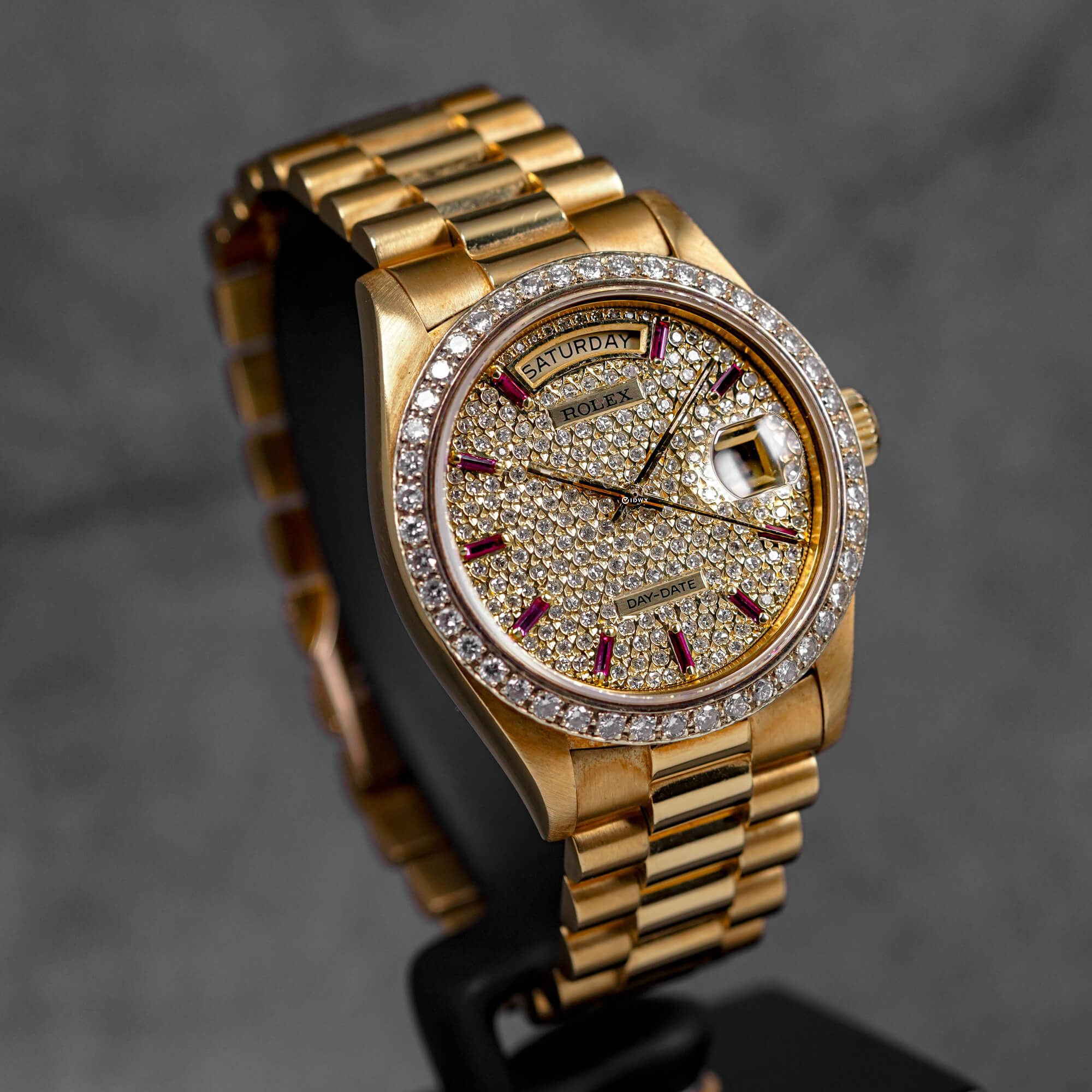 DAYDATE 36MM 18038 YELLOWGOLD CUSTOM DIAMOND & RUBY DIAL DIAMOND BEZEL (WATCH & BOX)