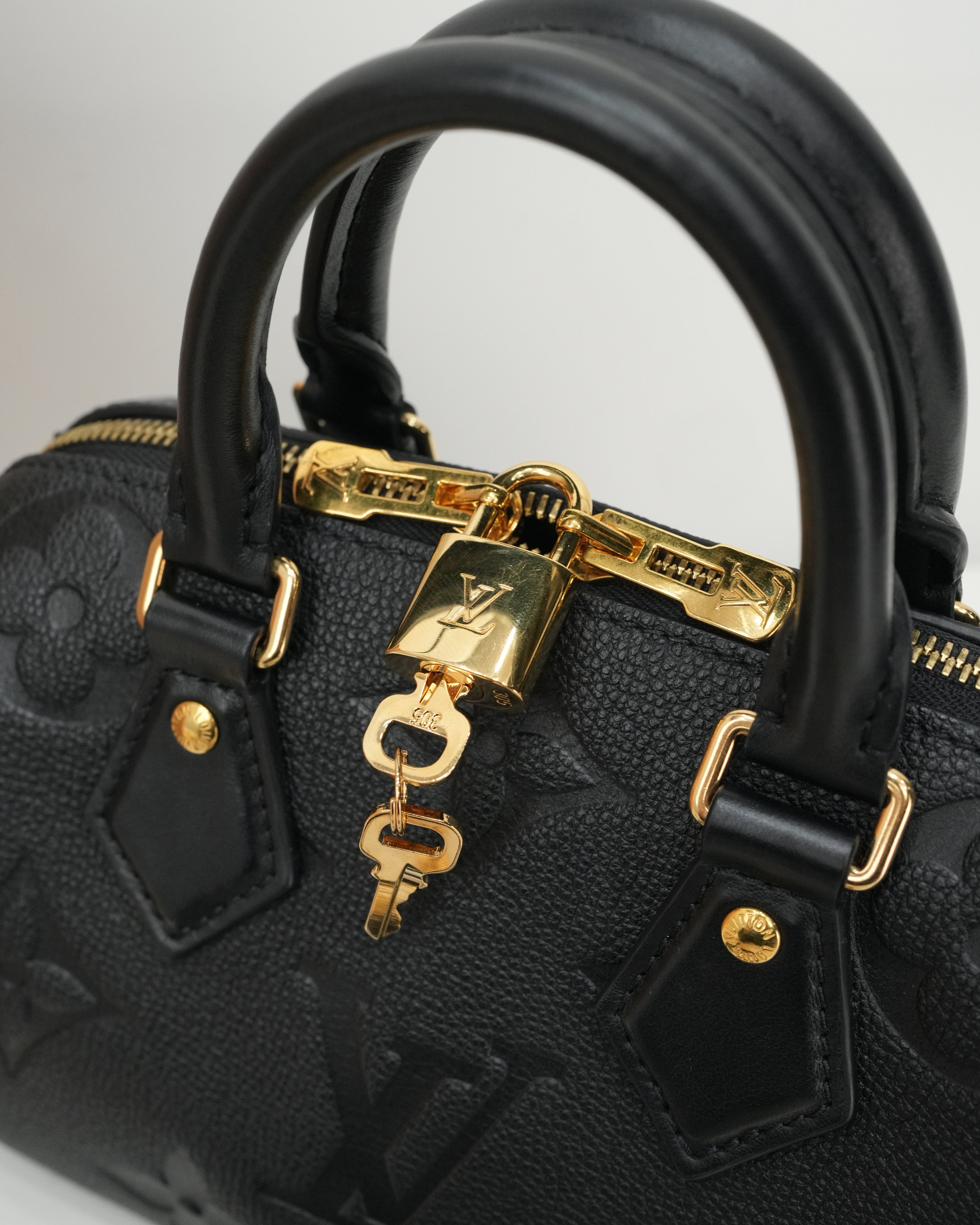 MONOGRAM EMPREINTE SPEEDY BANDOULIÈRE 20 BLACK