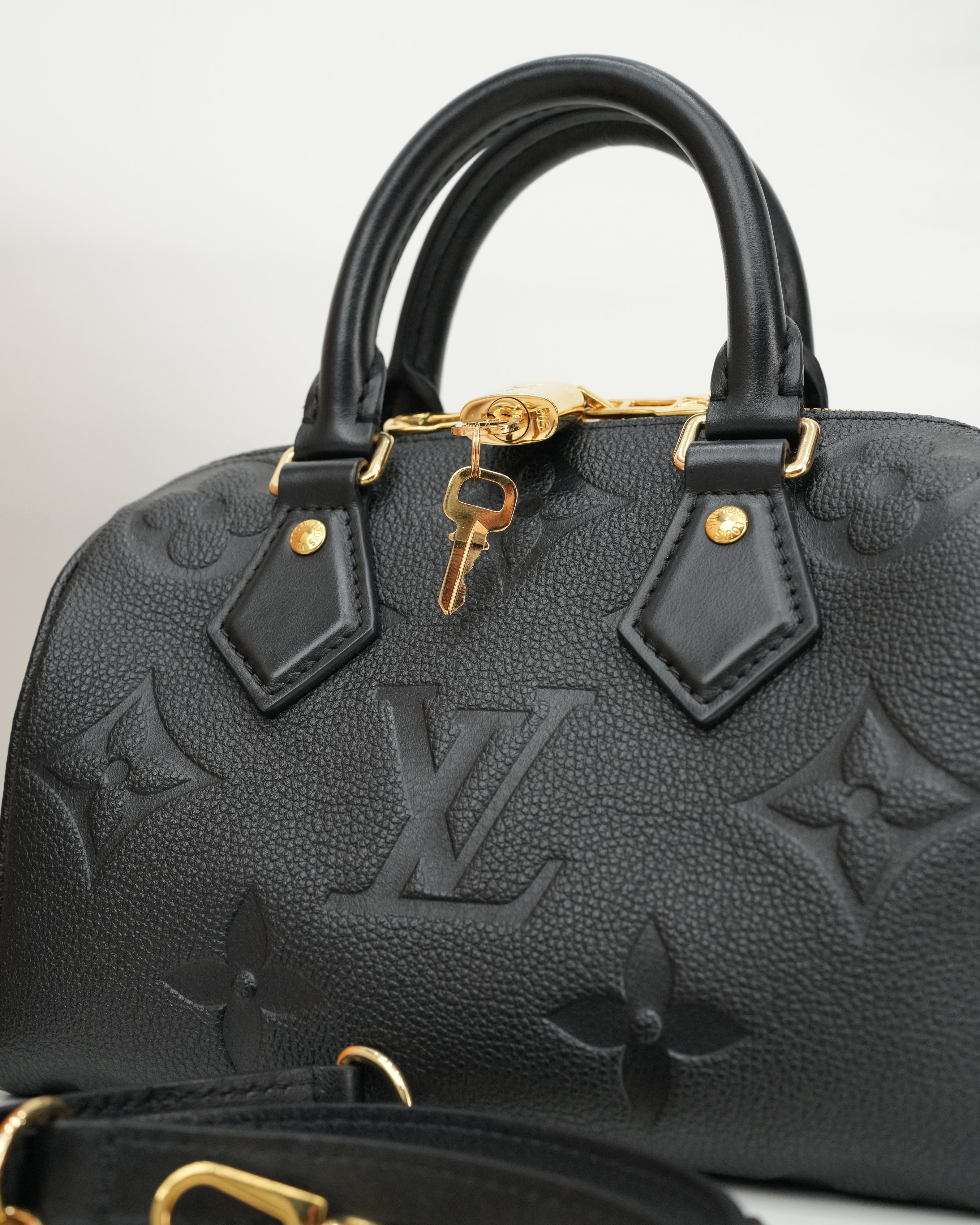 MONOGRAM EMPREINTE SPEEDY BANDOULIÈRE 20 BLACK