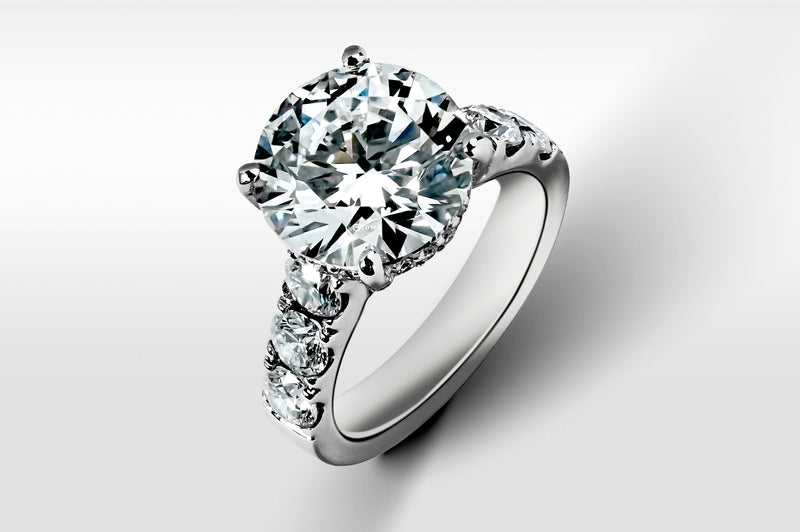 5CT ROUND BRILLIANT WITH SIDE DIAMOND RING (2023)