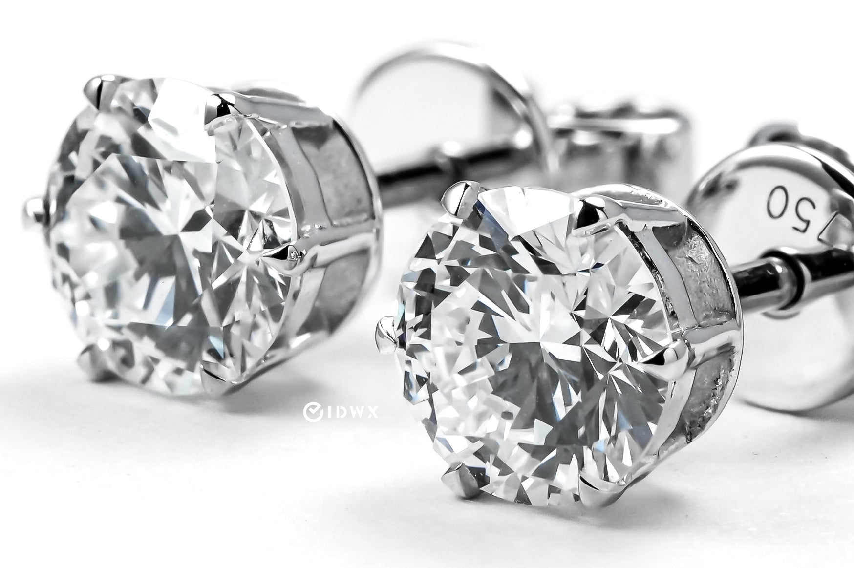 0.5CT ROUND BRILLIANT STUD EARRINGS