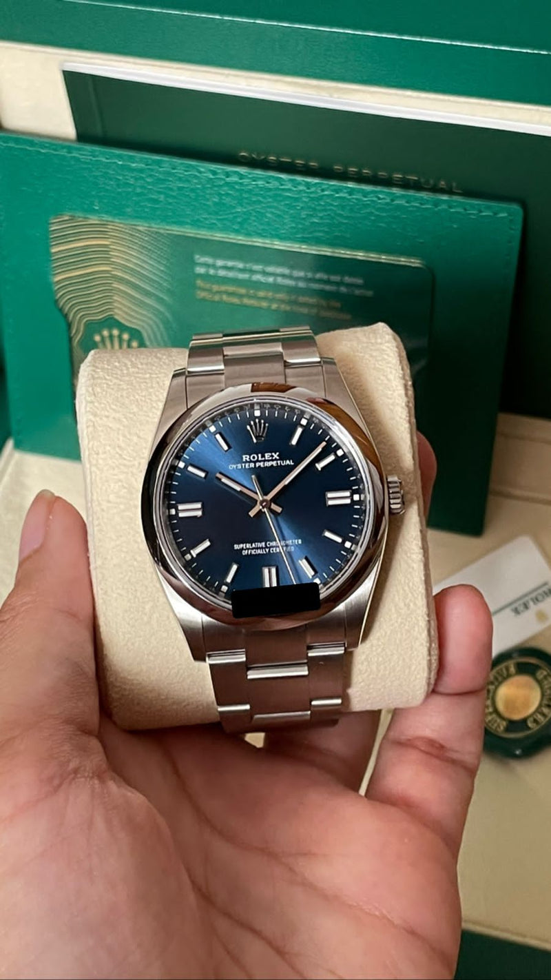 Rolex oyster perpetual blue dial 36mm hot sale