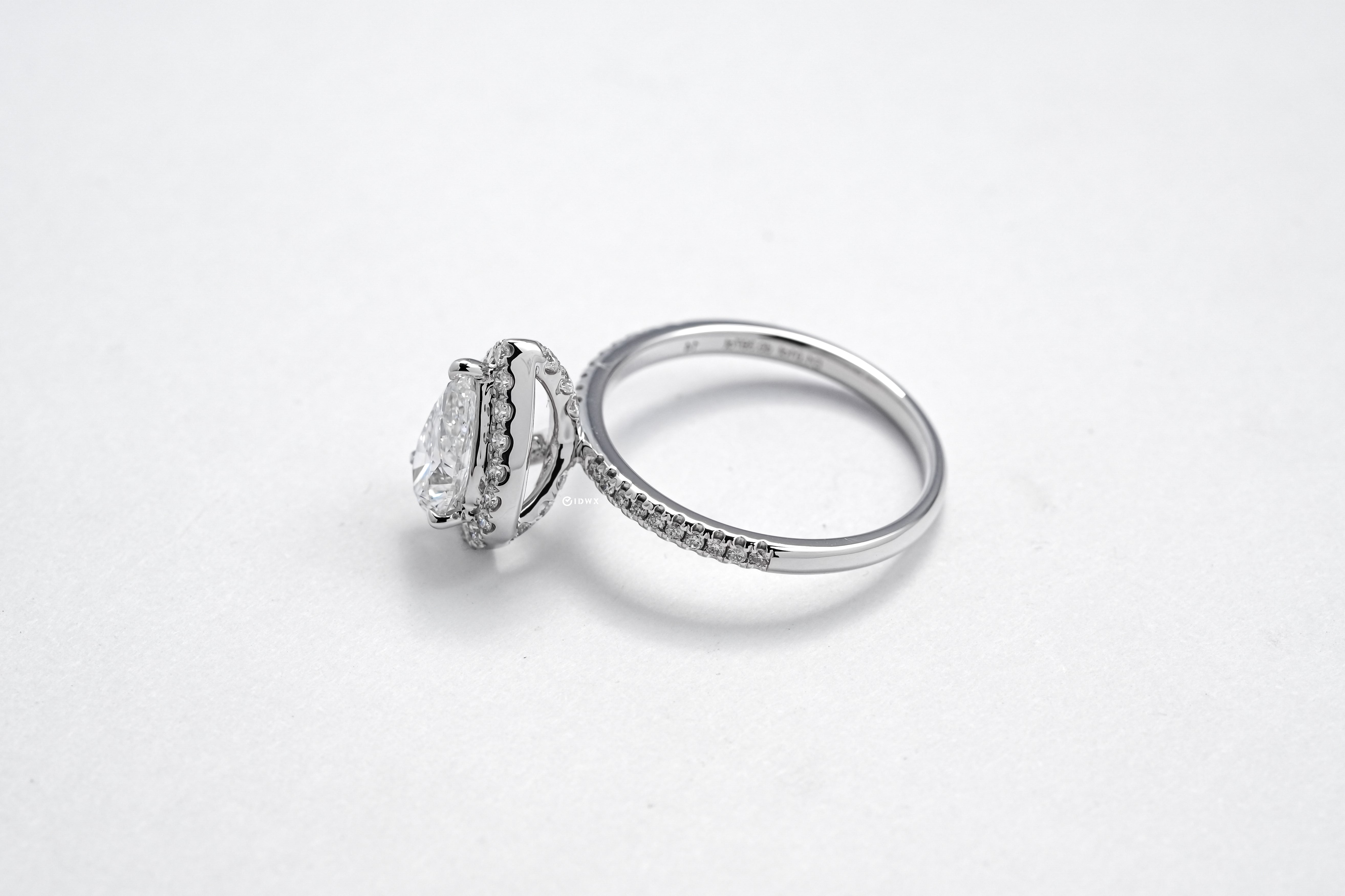 1CT PEAR BRILLIANT SIDE STONE WHITEGOLD HALO RING