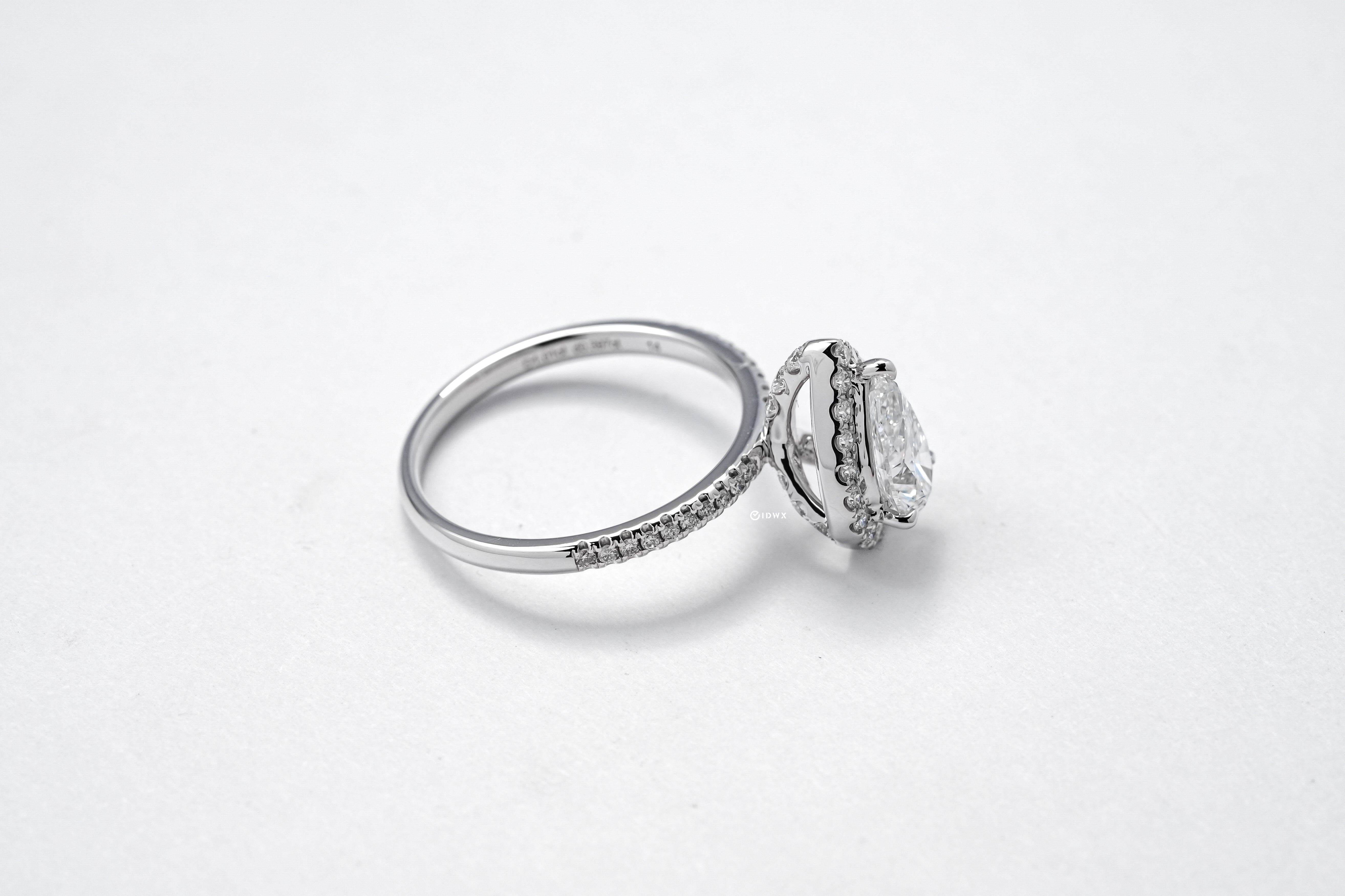 1CT PEAR BRILLIANT SIDE STONE WHITEGOLD HALO RING