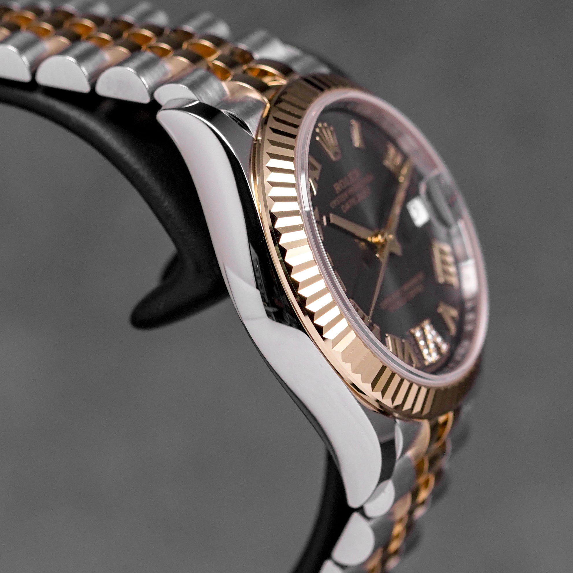 DATEJUST 31MM TWOTONE YELLOWGOLD DARK GREY ROMAN DIAL DIAMOND ON VI (2025)