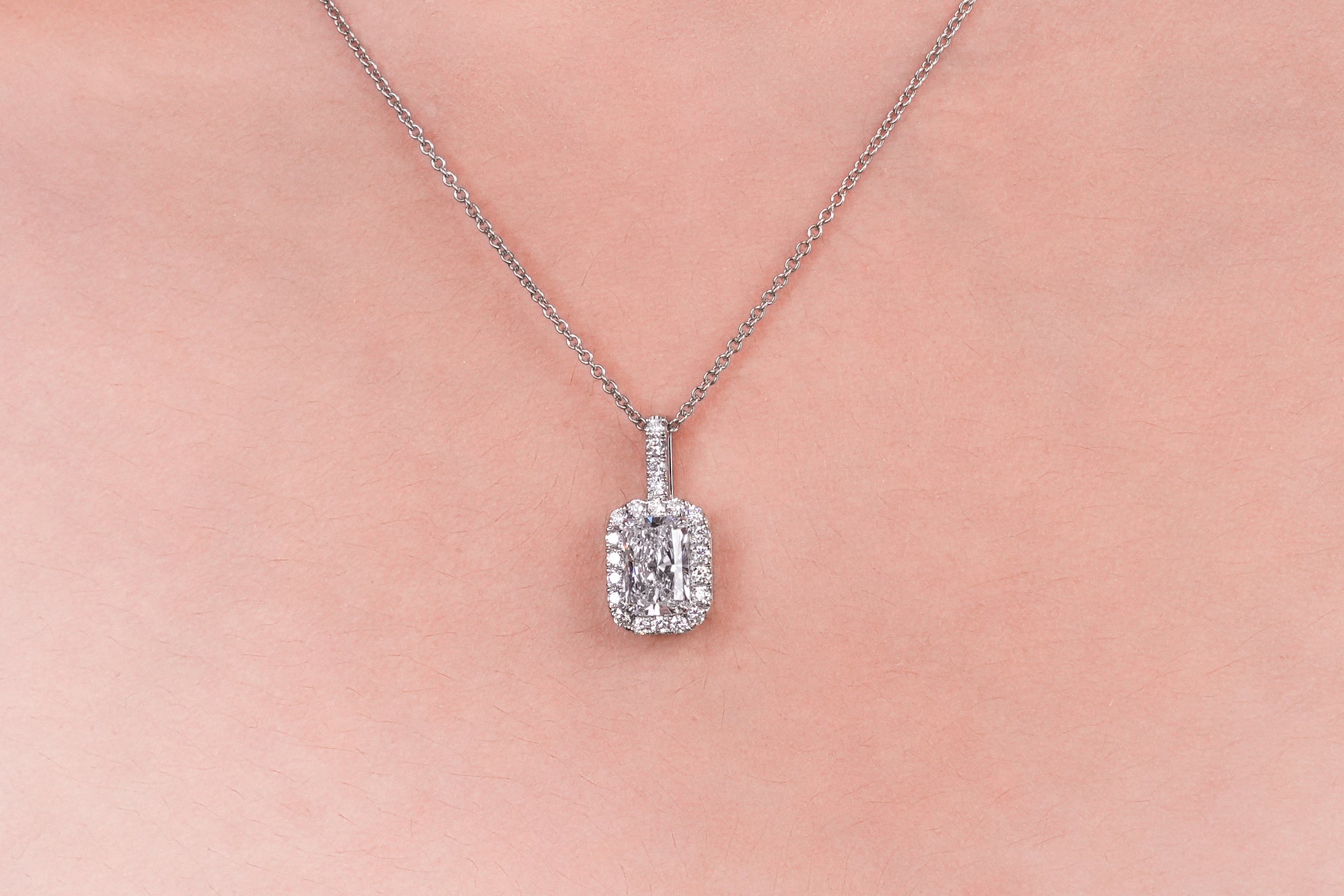 KELLY WHITEGOLD NECKLACE 1CT RADIANT CUT LAB DIAMOND WITH HALO SIDE STONE