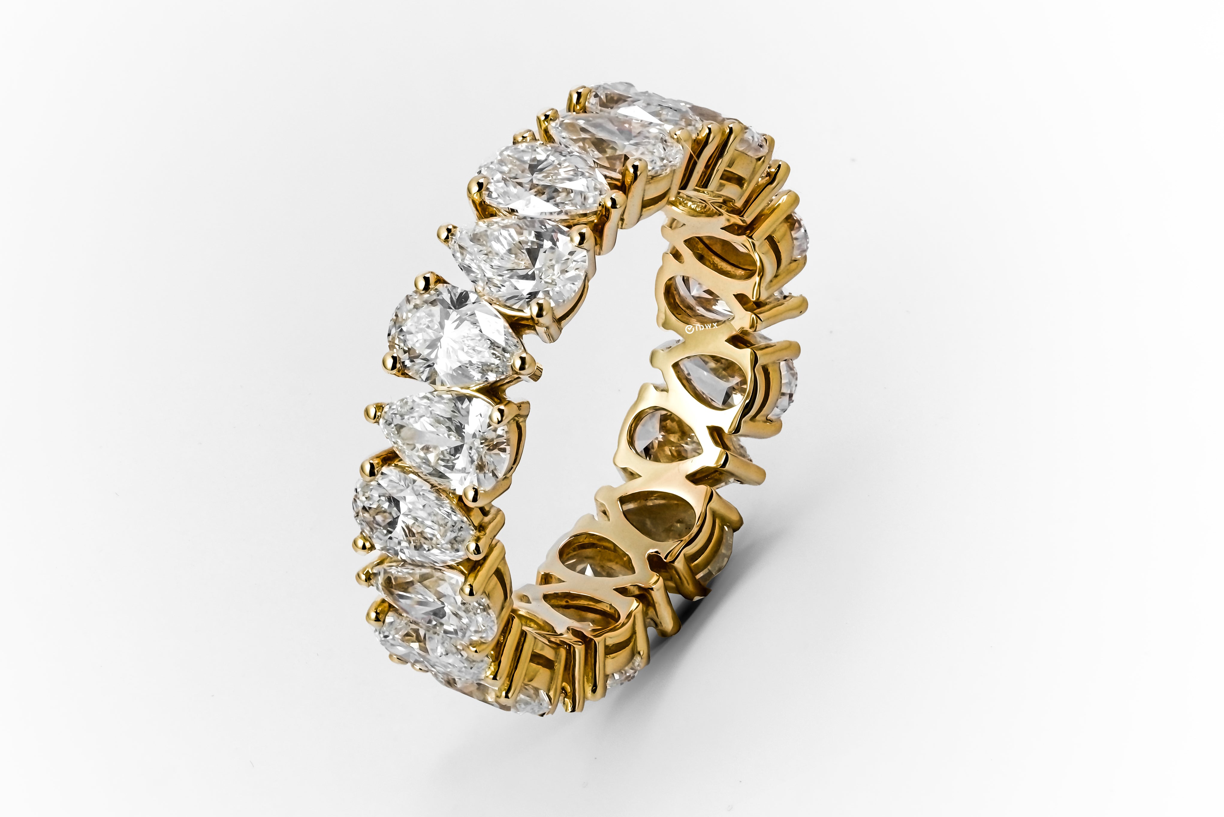 5CT PEAR BRILLIANT YELLOWGOLD ETERNITY RING