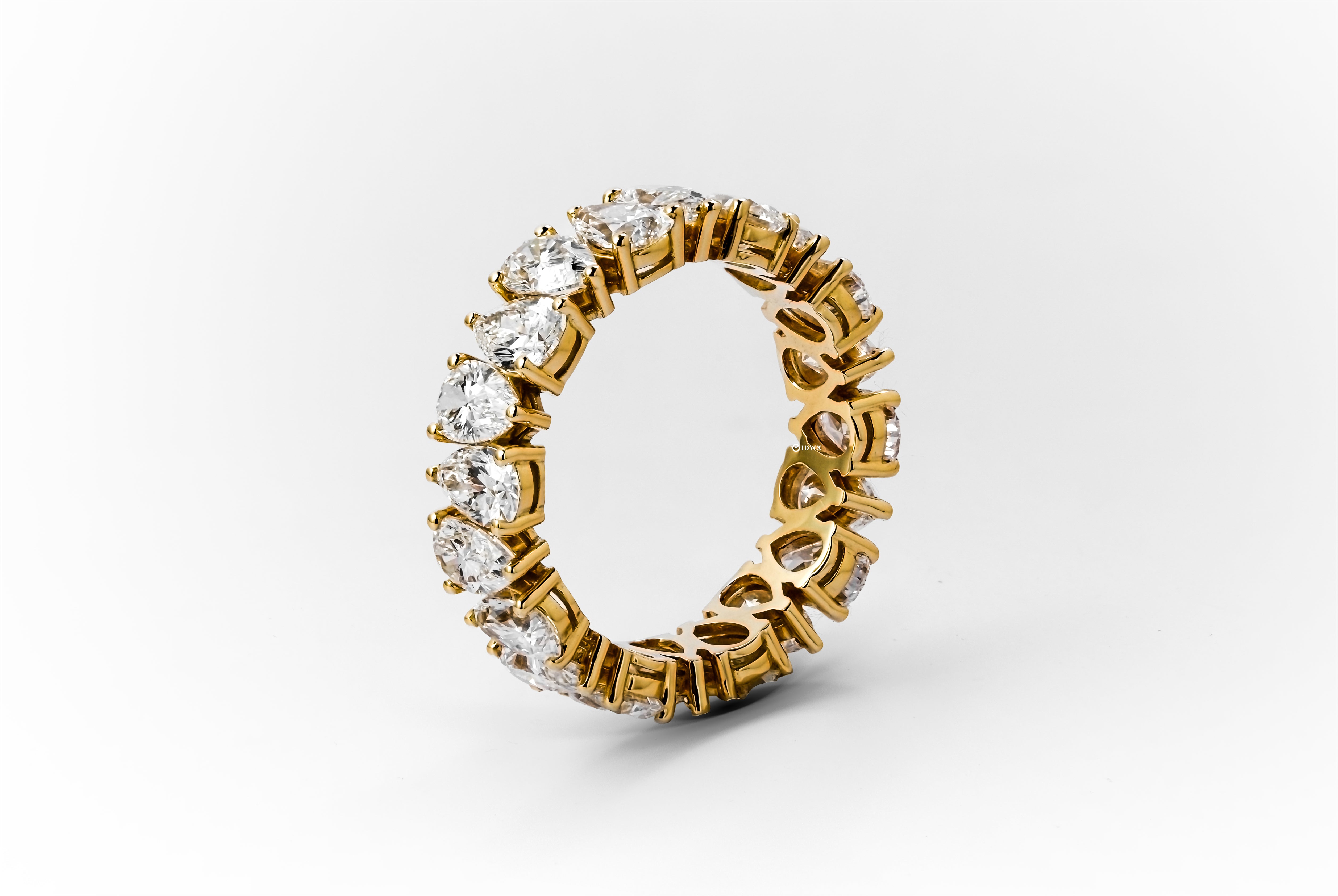 5CT PEAR BRILLIANT YELLOWGOLD ETERNITY RING