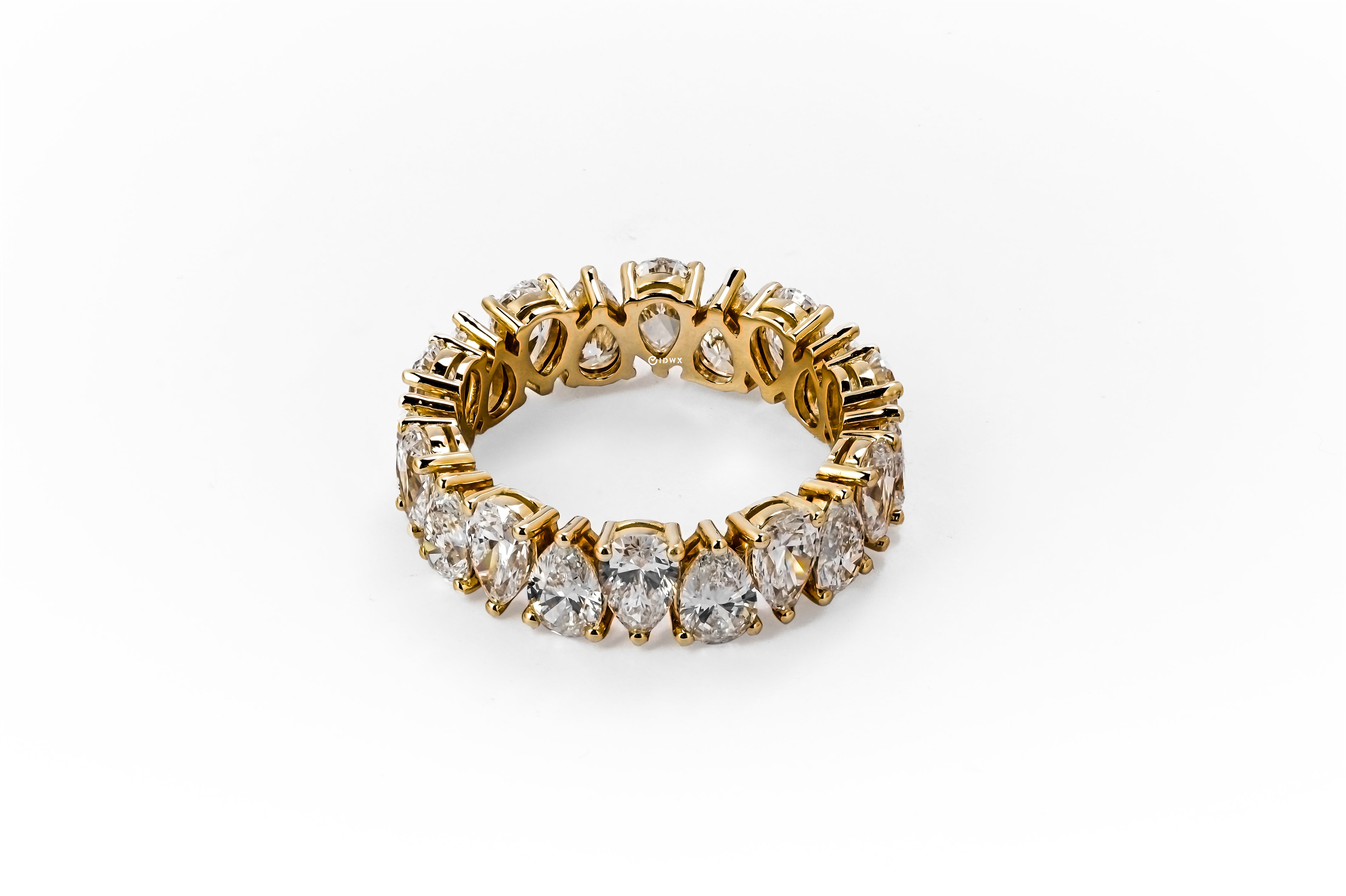 5CT PEAR BRILLIANT YELLOWGOLD ETERNITY RING