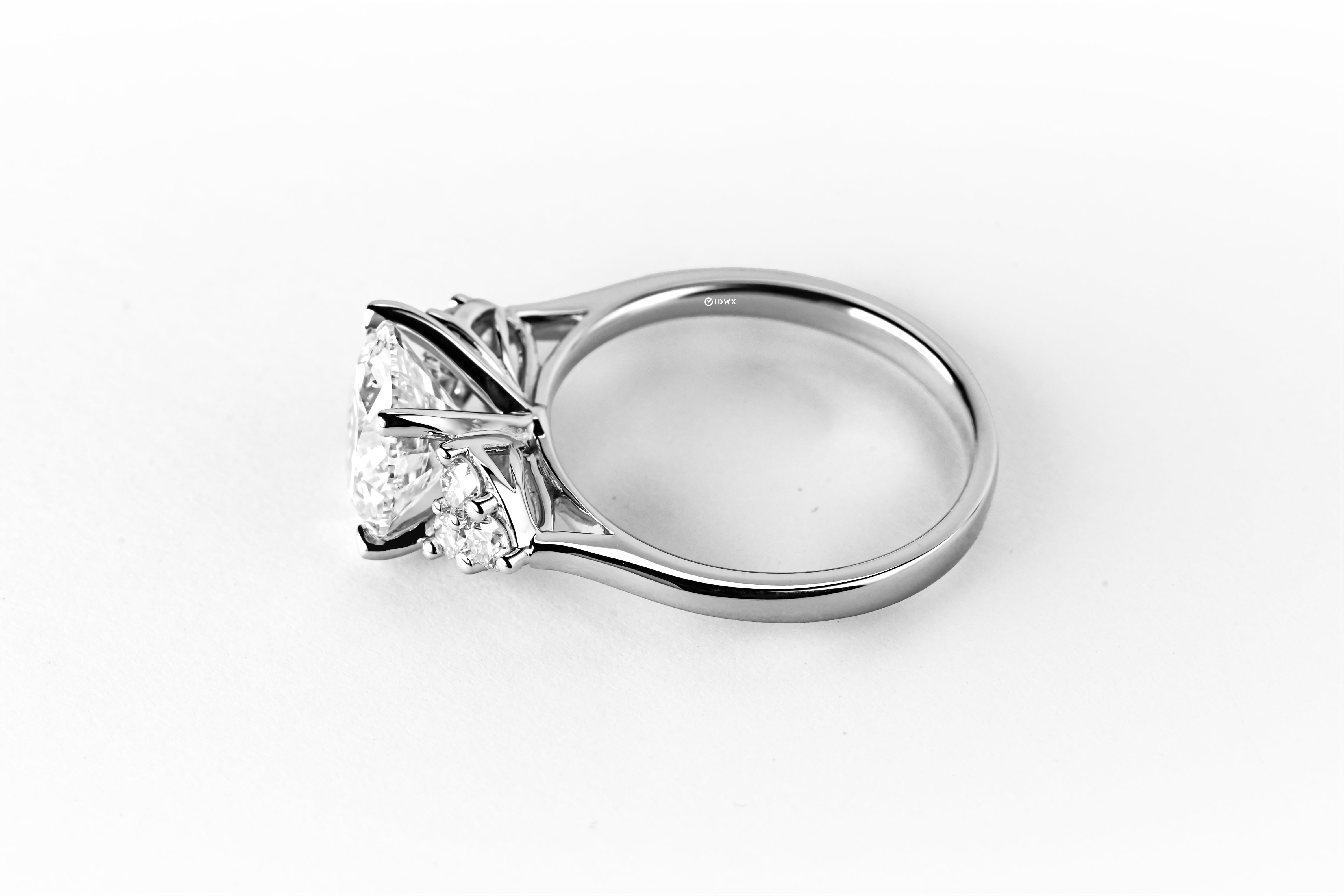 2CT ROUND BRILLIANT SIDE-STONE WHITEGOLD RING