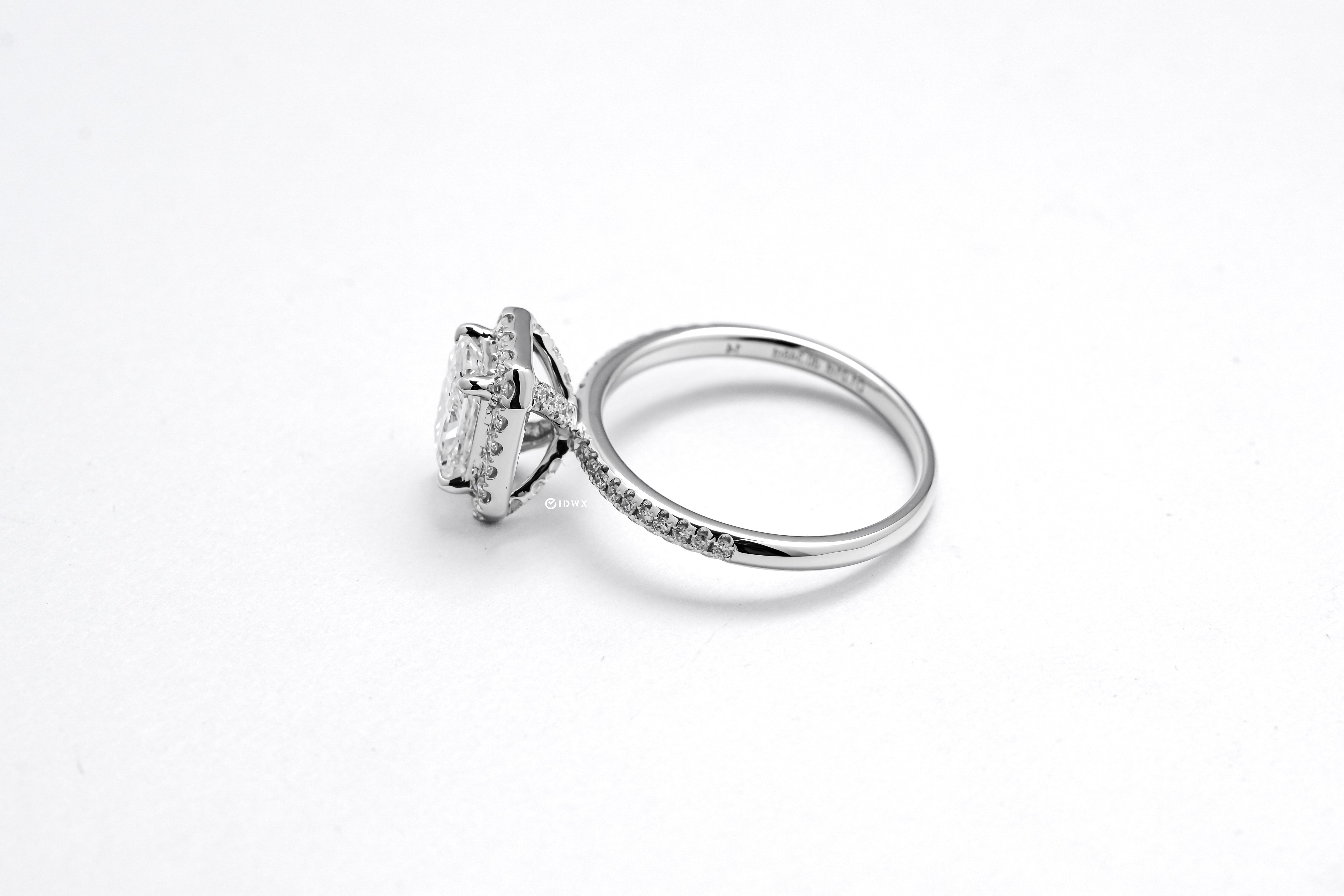 1CT RADIANT BRILLIANT SIDE STONE WHITEGOLD HALO RING