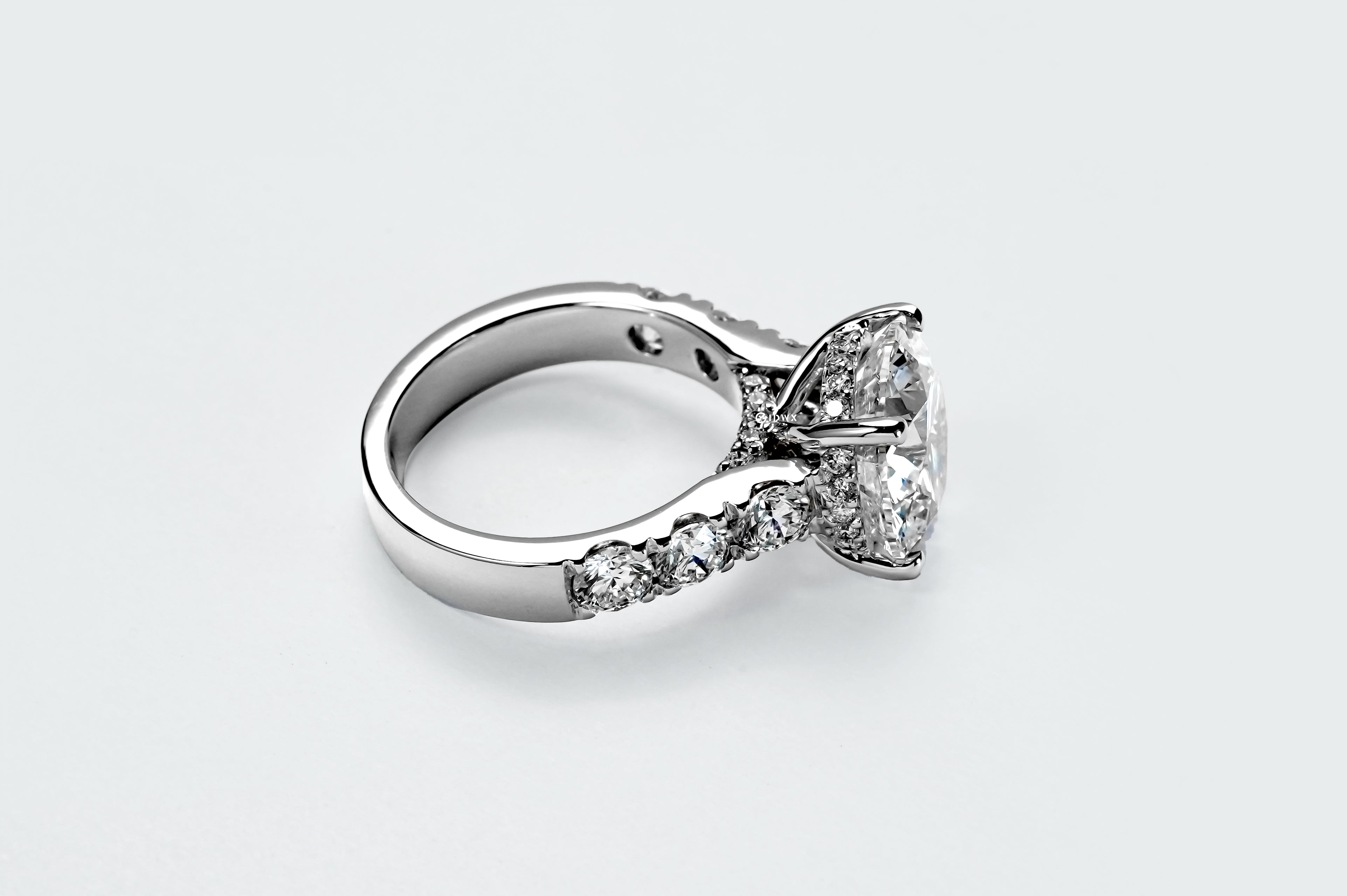 5CT ROUND BRILLIANT SIDE-STONE DIAMOND RING