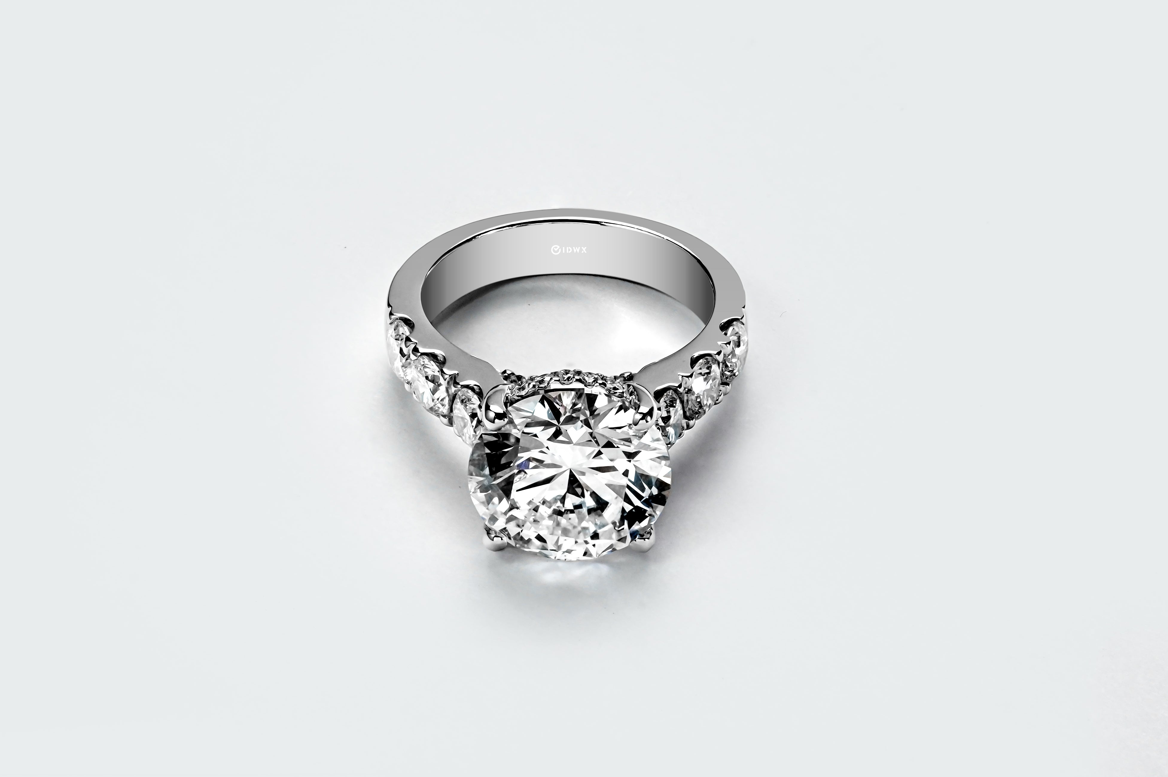 5CT ROUND BRILLIANT SIDE-STONE DIAMOND RING