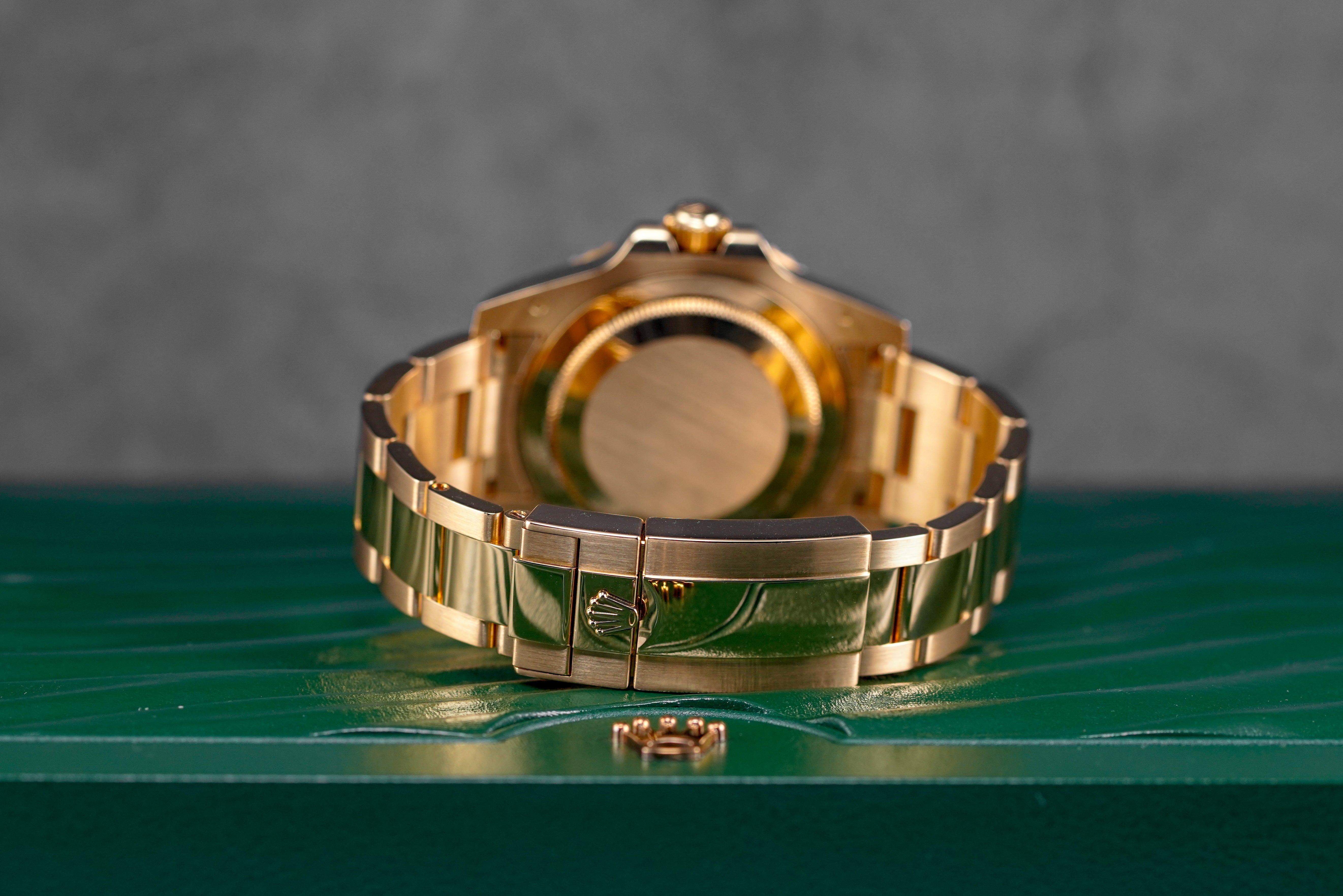 Harga Rolex GMT Master II Yellowgold Black