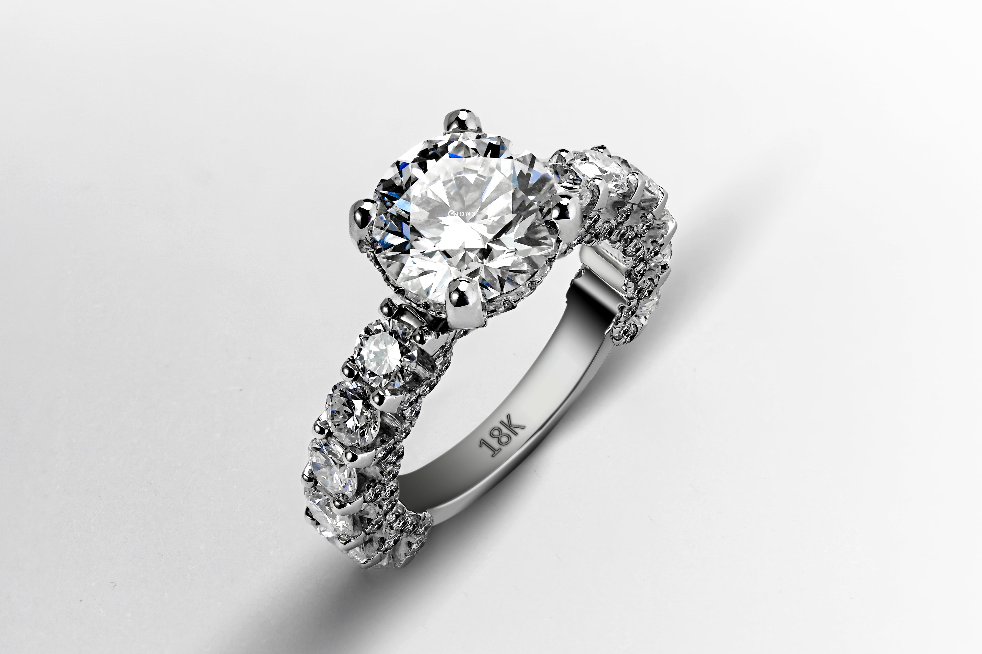 3CT ROUND BRILLIANT SIDE-STONE RING