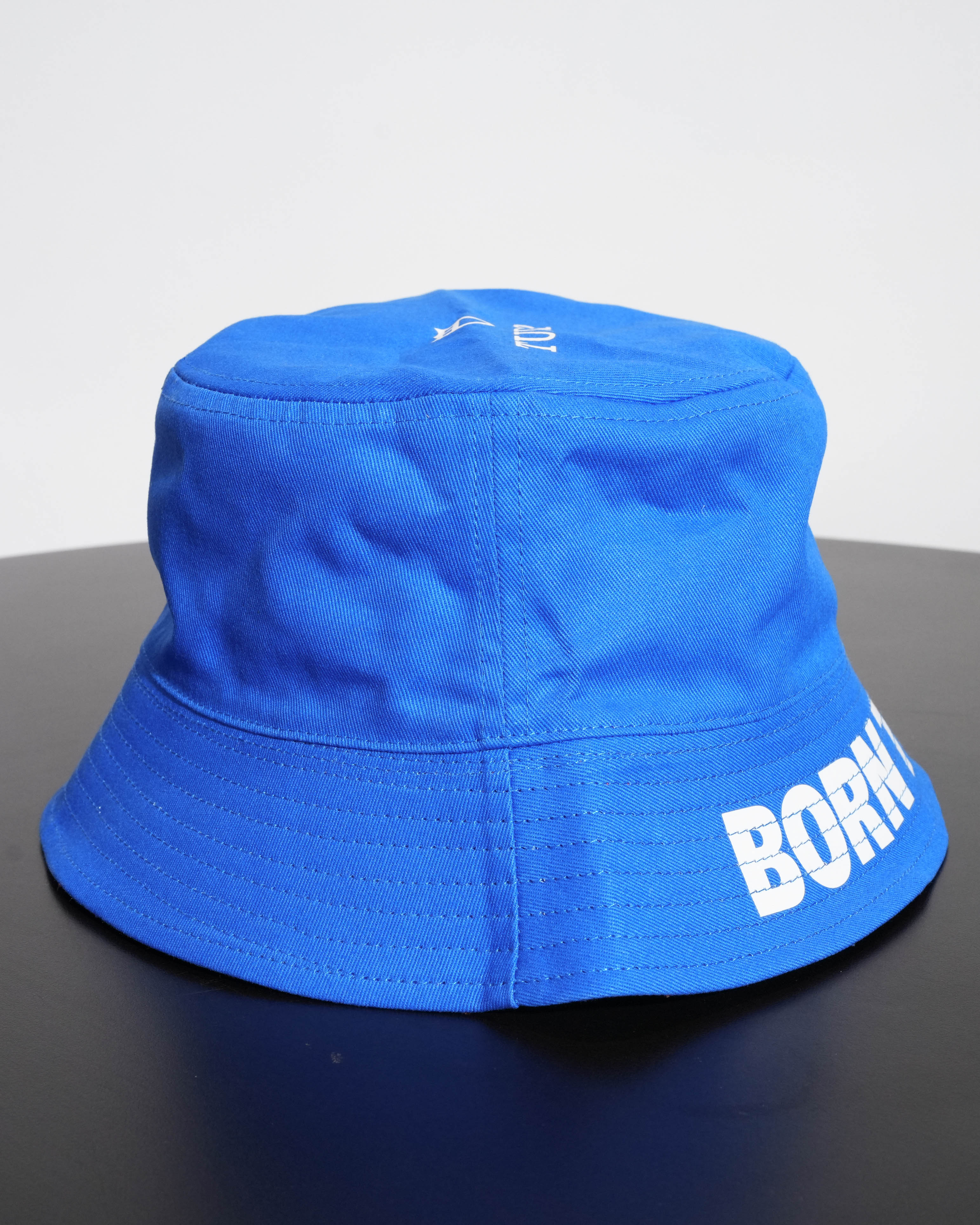 REVERSIBLE BUCKET HAT BLUE RED BORN TO DARE