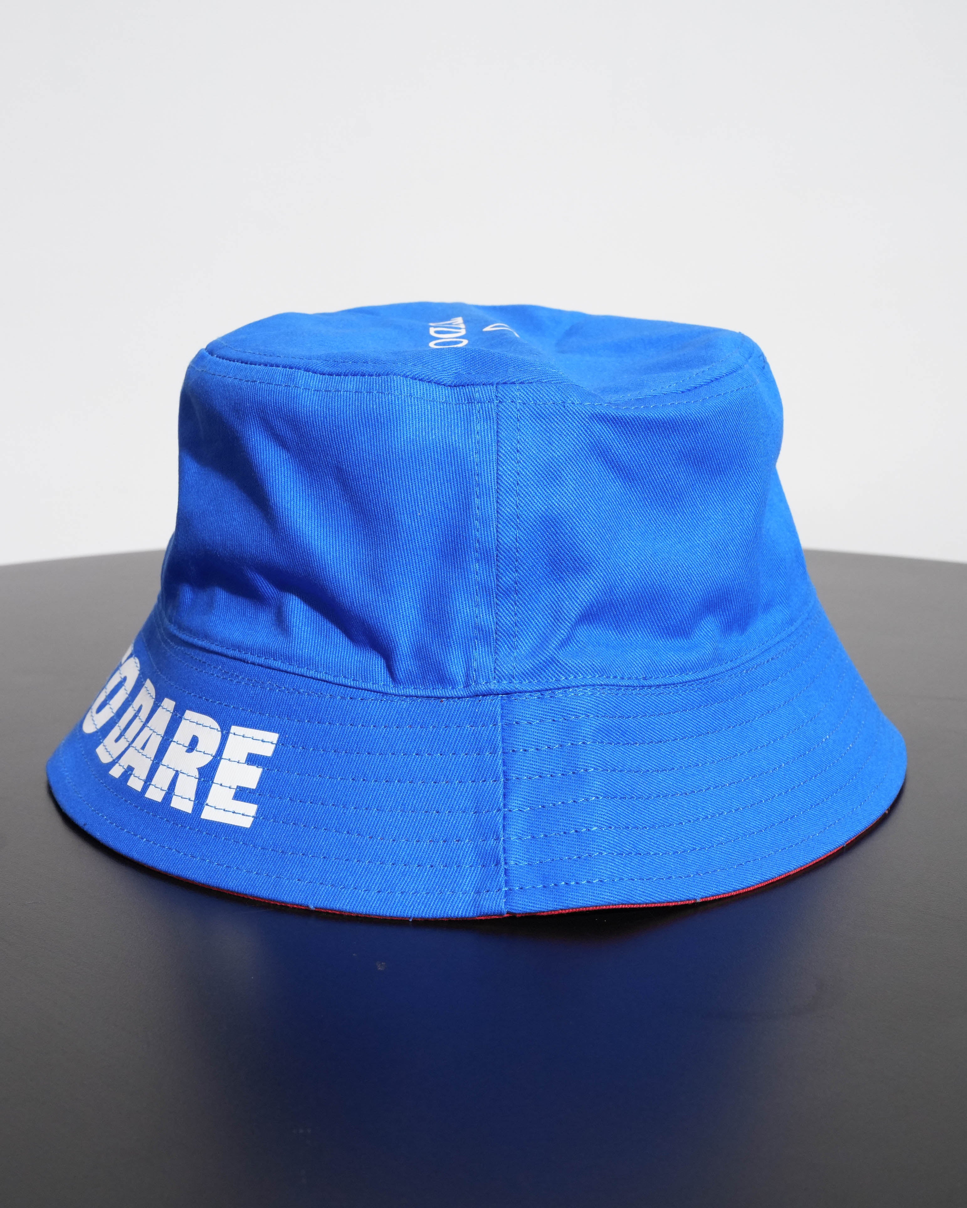REVERSIBLE BUCKET HAT BLUE RED BORN TO DARE