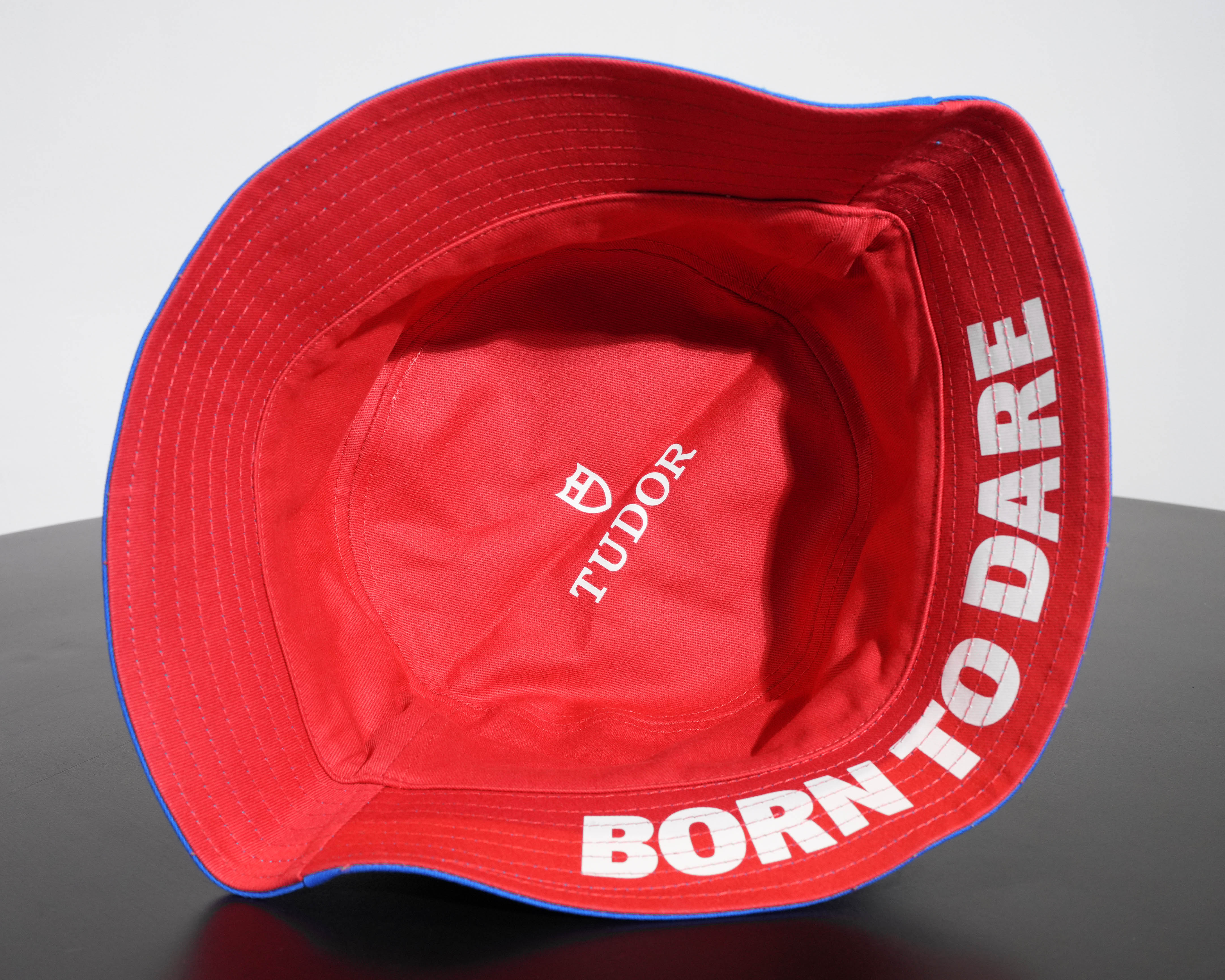 REVERSIBLE BUCKET HAT BLUE RED BORN TO DARE