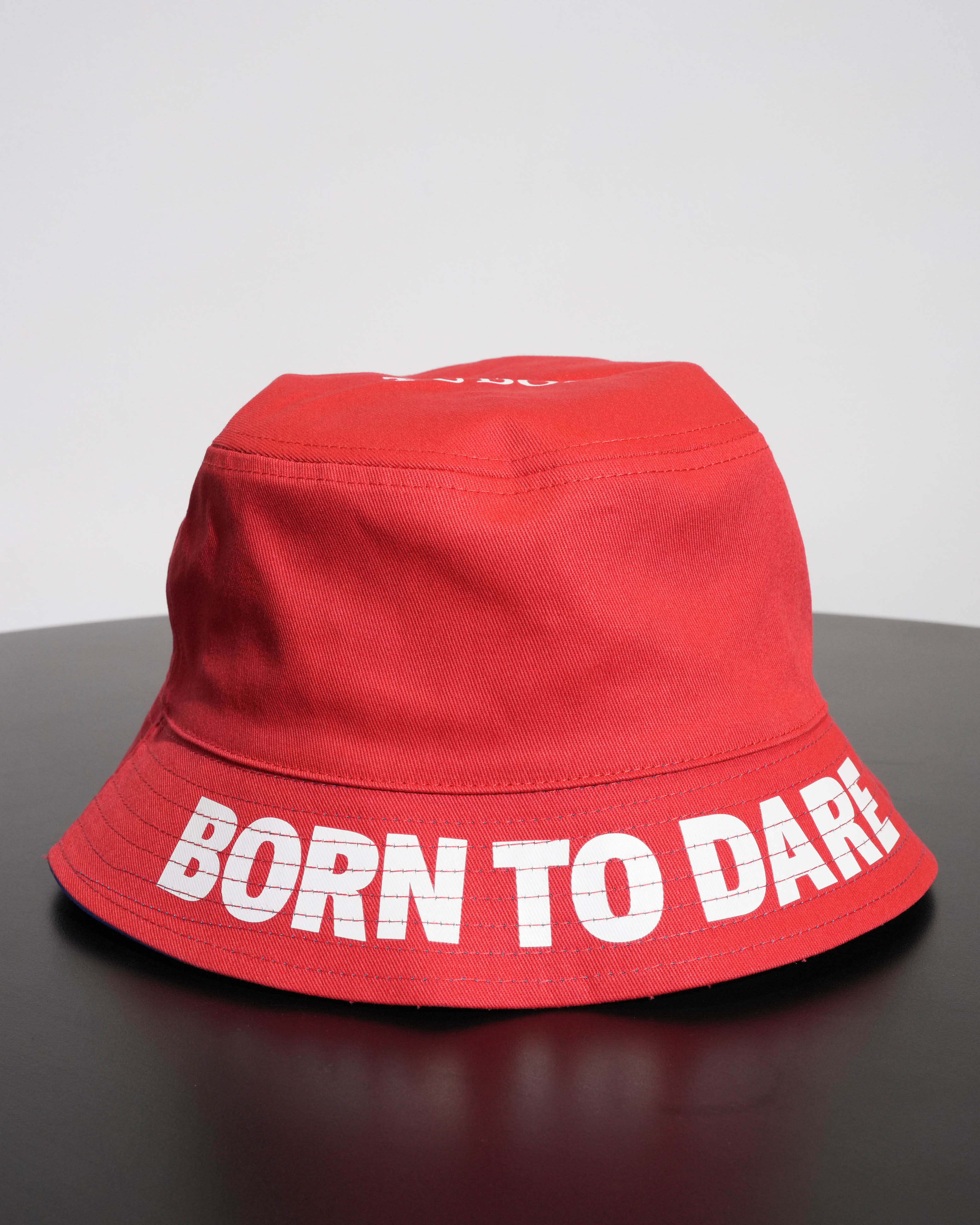 REVERSIBLE BUCKET HAT BLUE RED BORN TO DARE