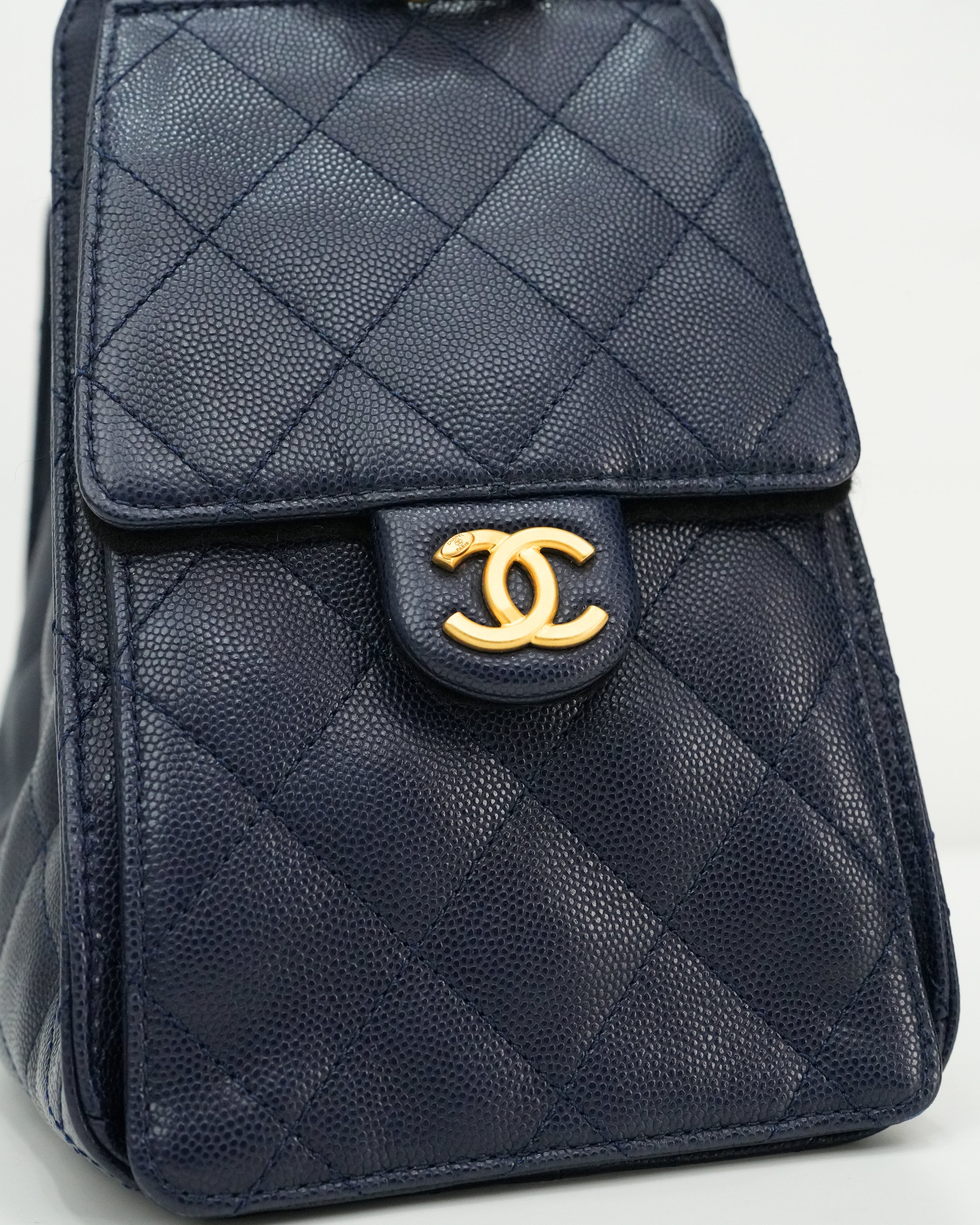 25 SMALL CAVIAR NAVY BLUE GOLD HARDWARE