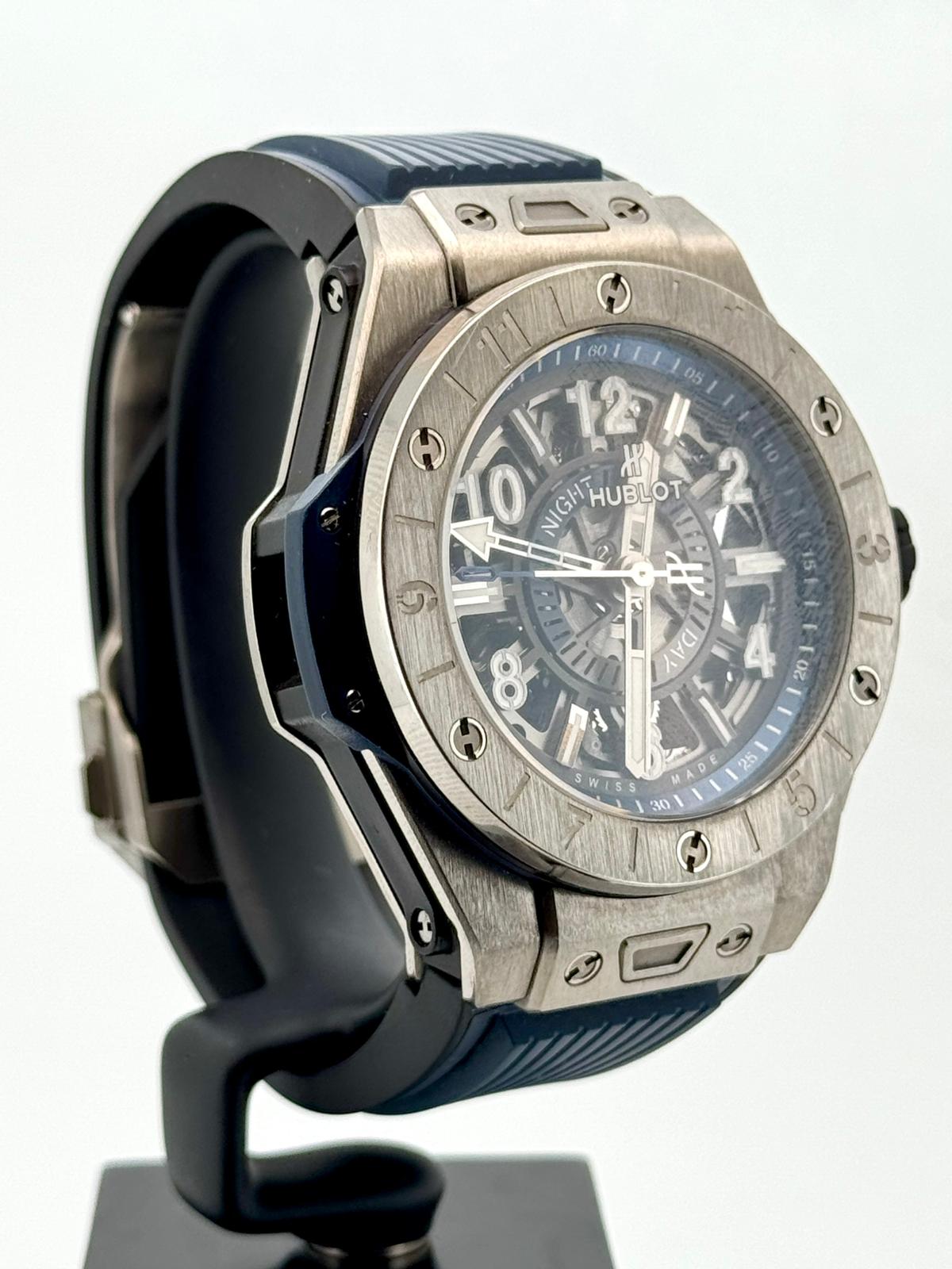 BIG BANG UNICO GMT 45MM TITANIUM BLUE GREY SKELETON DIAL (WATCH & PAPER)