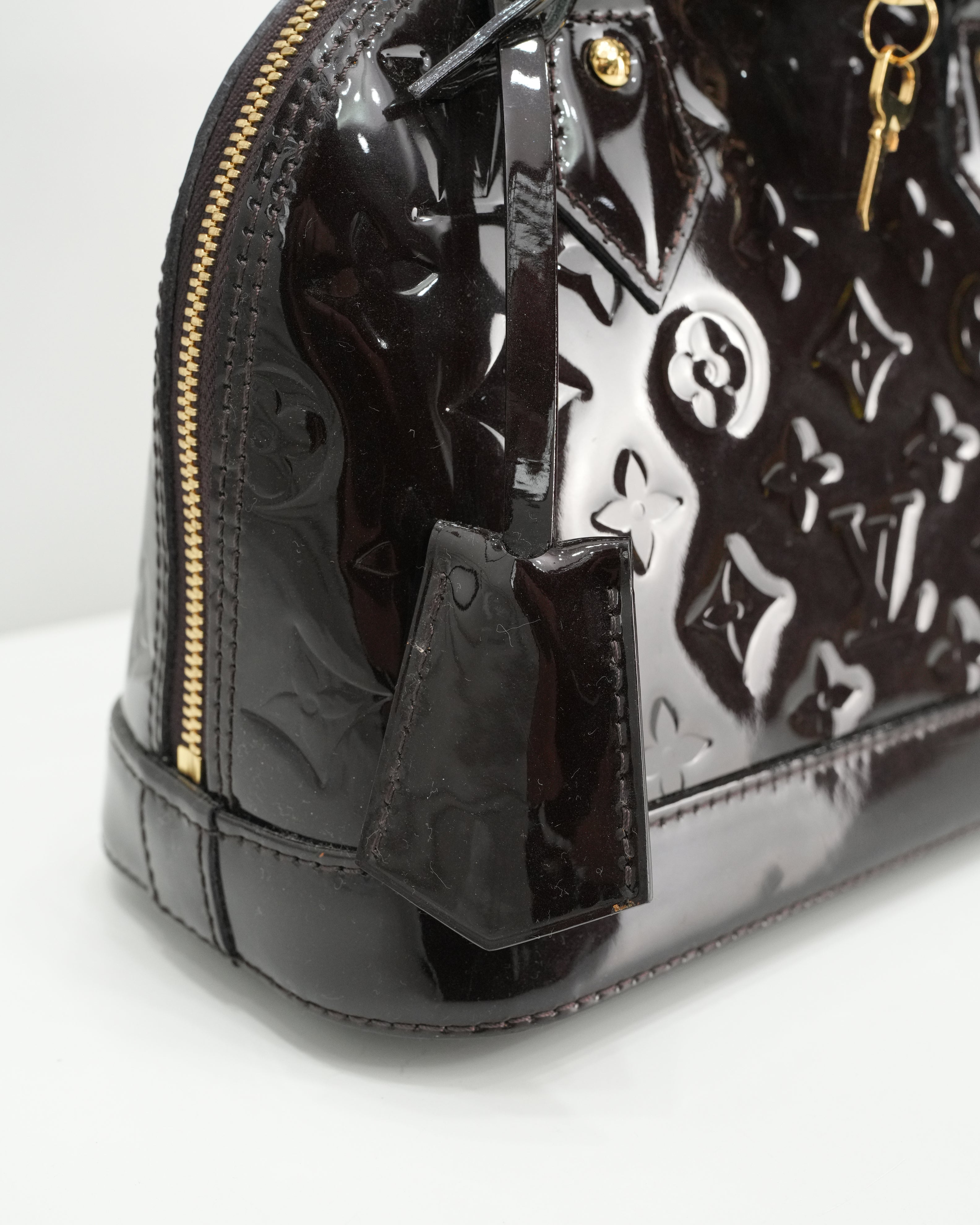 MONOGRAM VERNIS ALMA BB AMARANTE