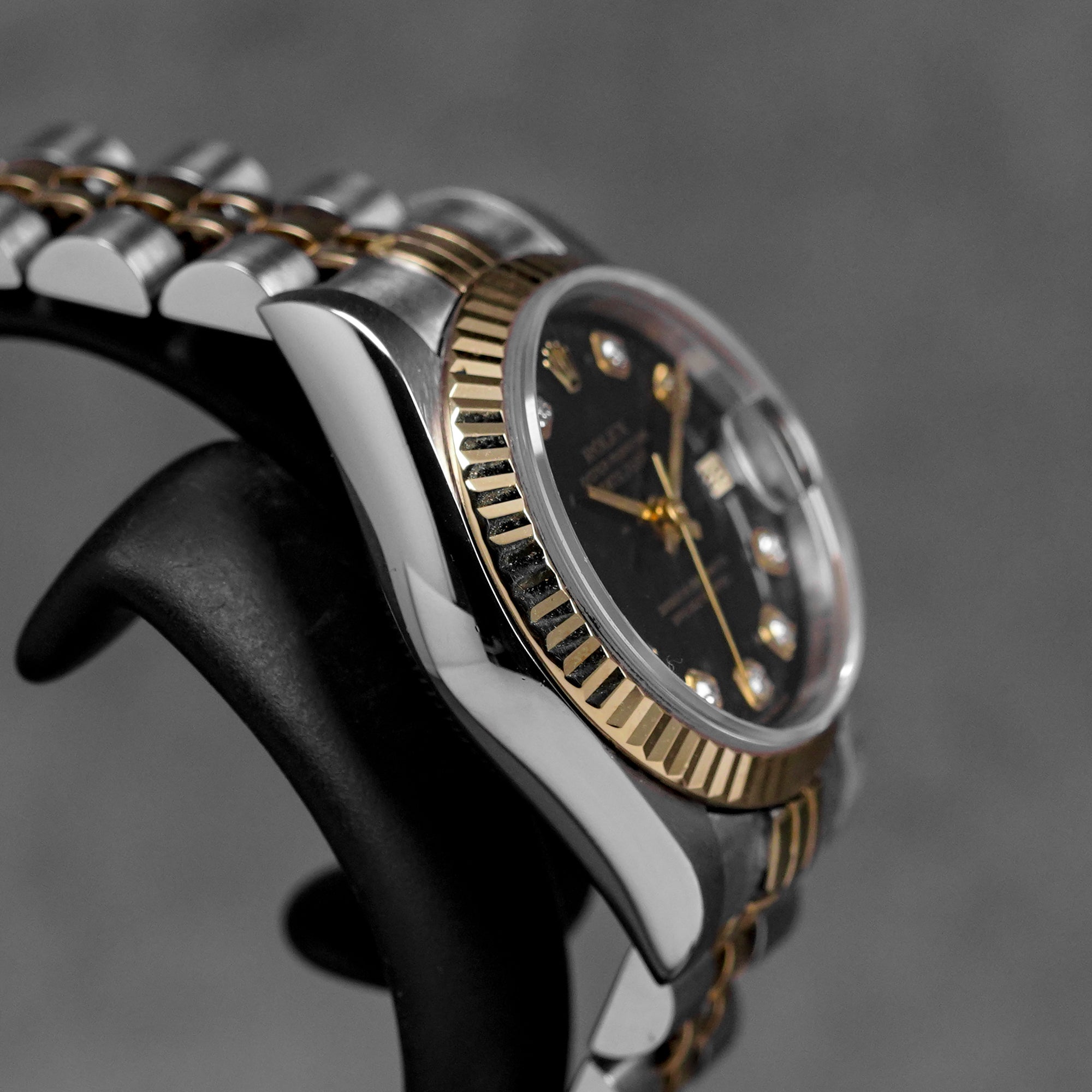 DATEJUST 26MM TWOTONE YELLOWGOLD BLACK DIAMOND DIAL (1999)