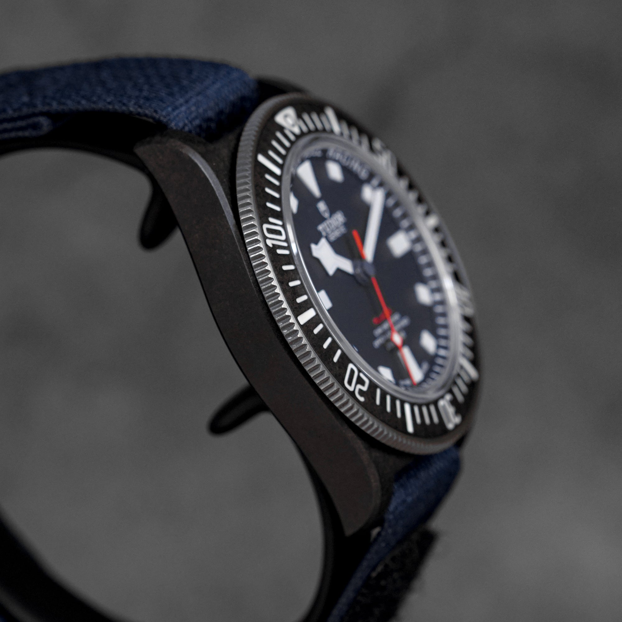 PELAGOS FXD BLACK CARBON 'ALINGHI RED BULL' BLUE DIAL (2025)