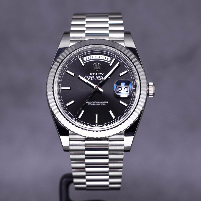 Rolex day date 40 deals white gold black dial