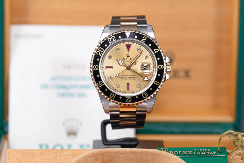 GMT MASTER-II TWOTONE YELLOWGOLD CHAMPAGNE DIAL DIAMOND INDEX WITH RUBY 'S SERIES' (CIRCA 1993)