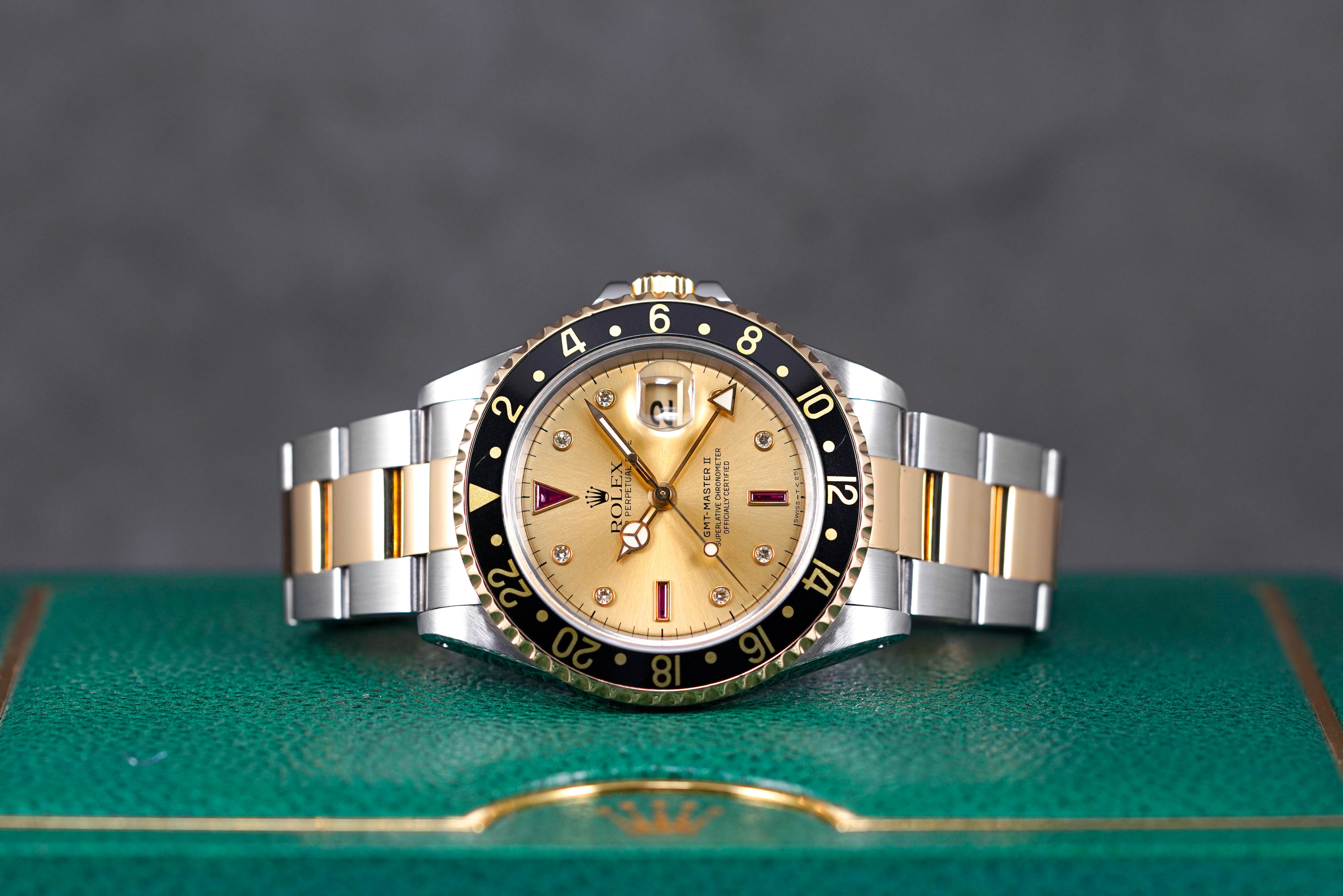 ROLEX GMT MASTER-II TWOTONE YELLOWGOLD CHAMPAGNE DIAL DIAMOND