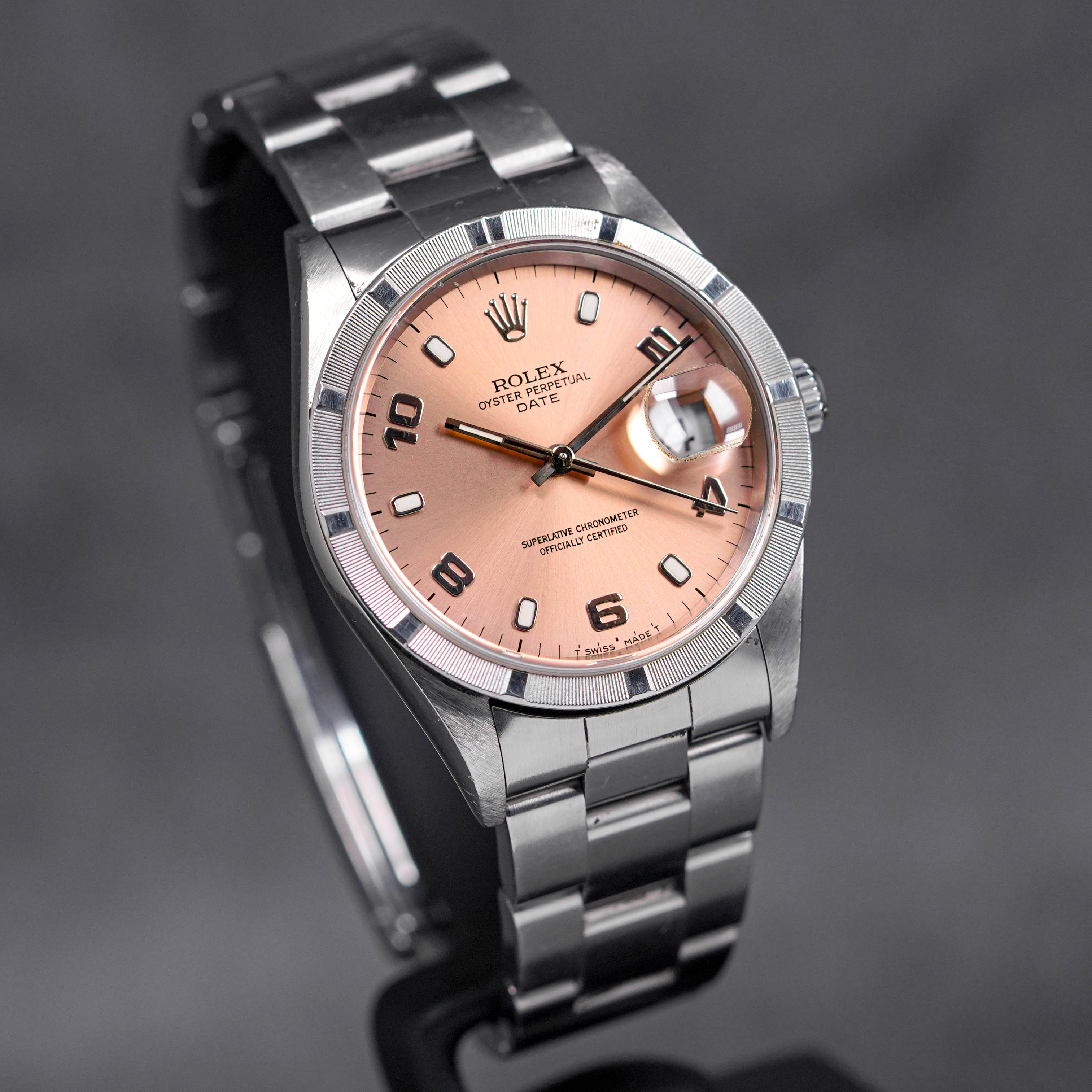 OYSTER PERPETUAL DATE 34MM 15210 ENGINE-TURNED BEZEL SALMON DIAL (1999)